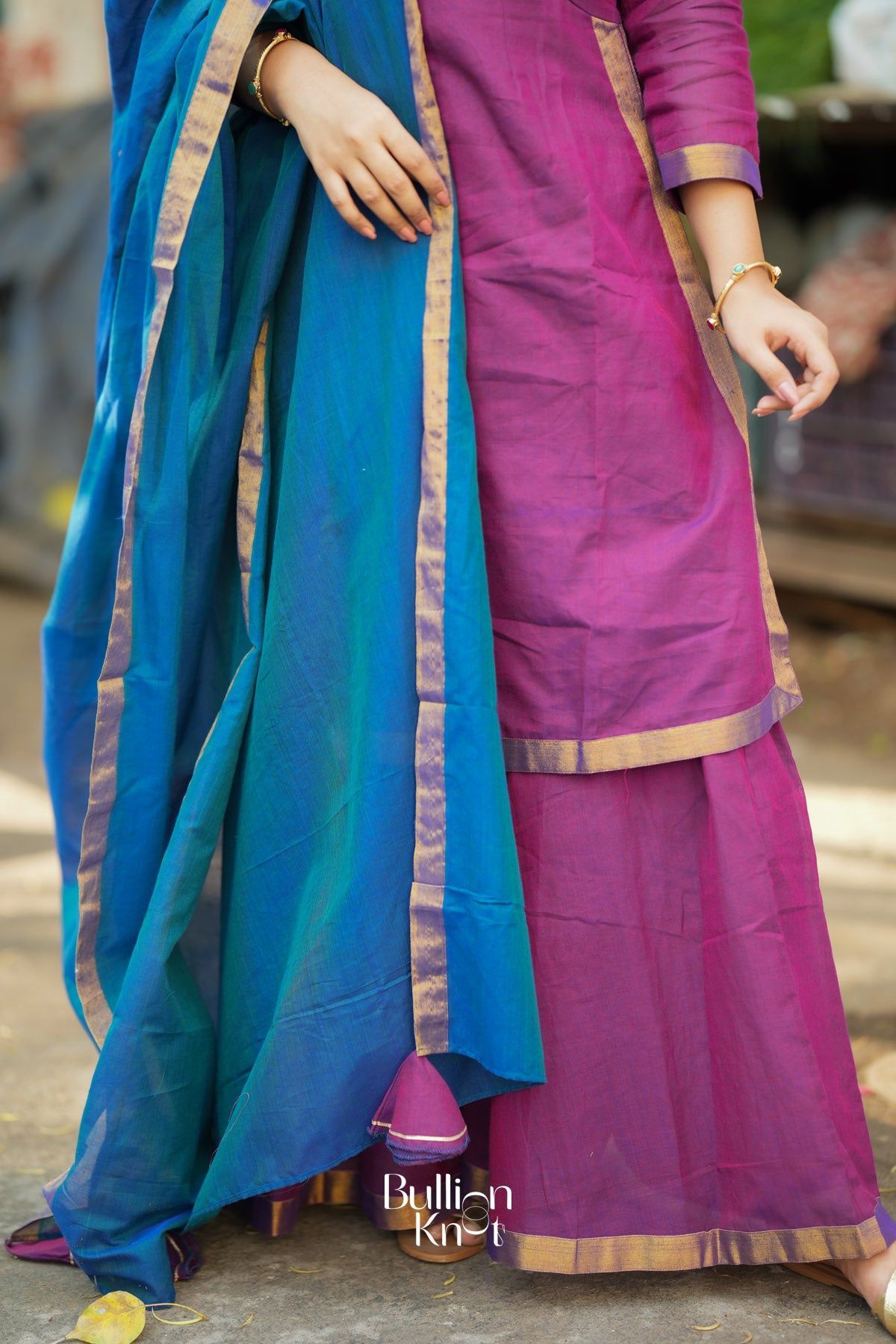 Blue and pink traditional kurta set with gold border