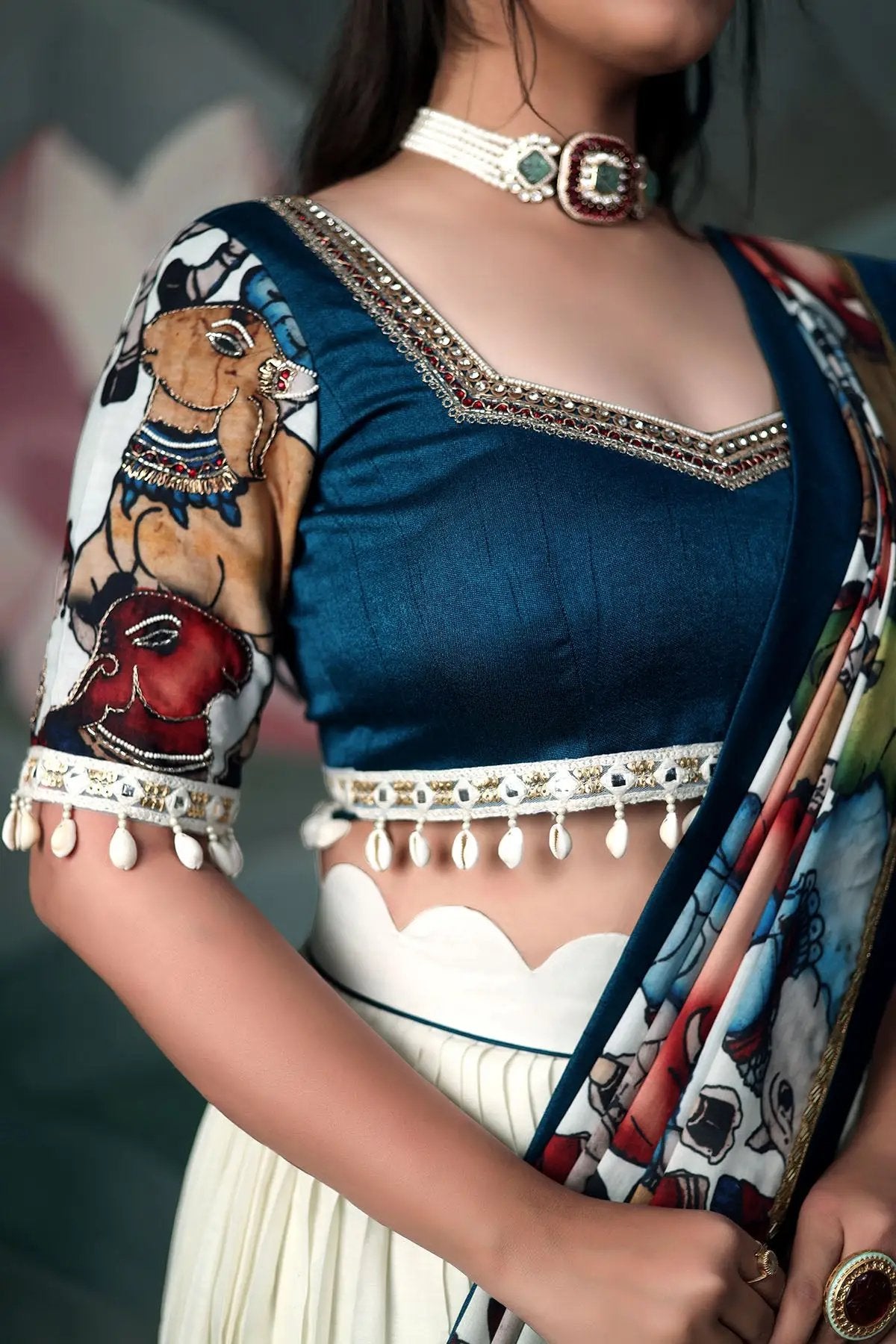a women showing lehenga design for women, dress name is Pen Kalamkari Lehenga Set