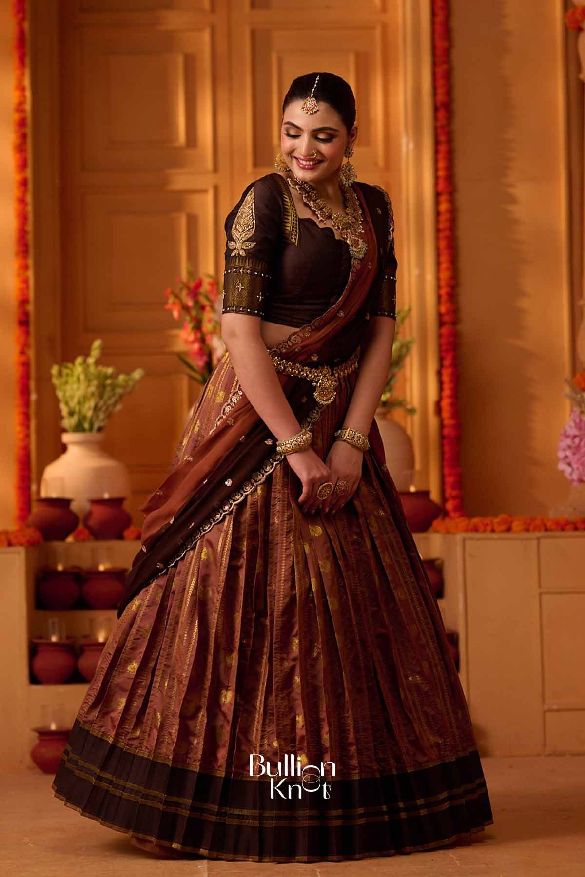 Lehenga size chart displaying measurements in inches for XS to XXL, including chest, waist, and skirt length for traditional attire fitting