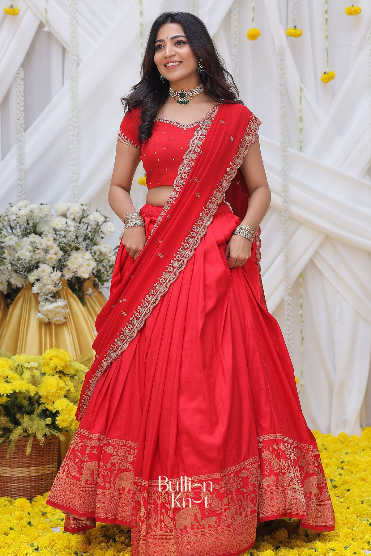 a women wear red color maharani lehenga set