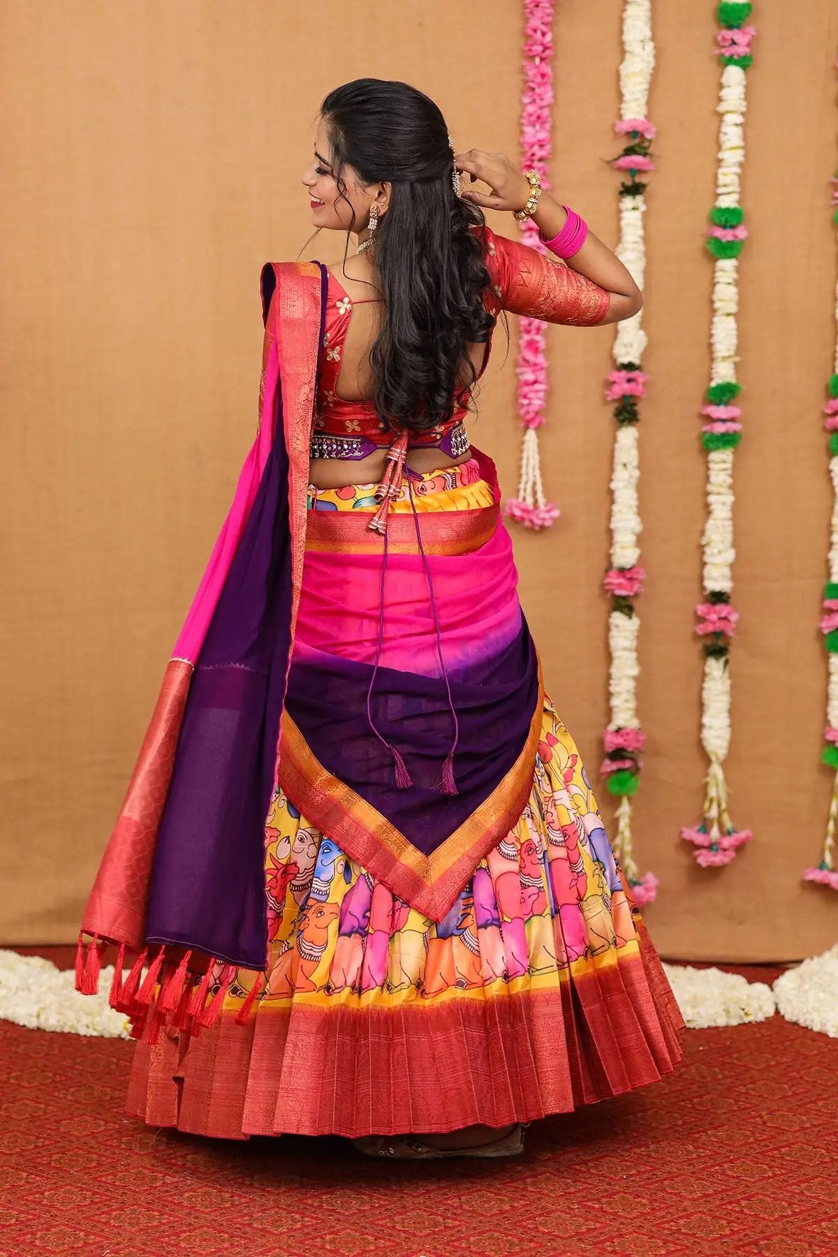 a woman in Pink, Yellow, Purple Ekapranika Banarasi Silk Half Saree - Bullionknot