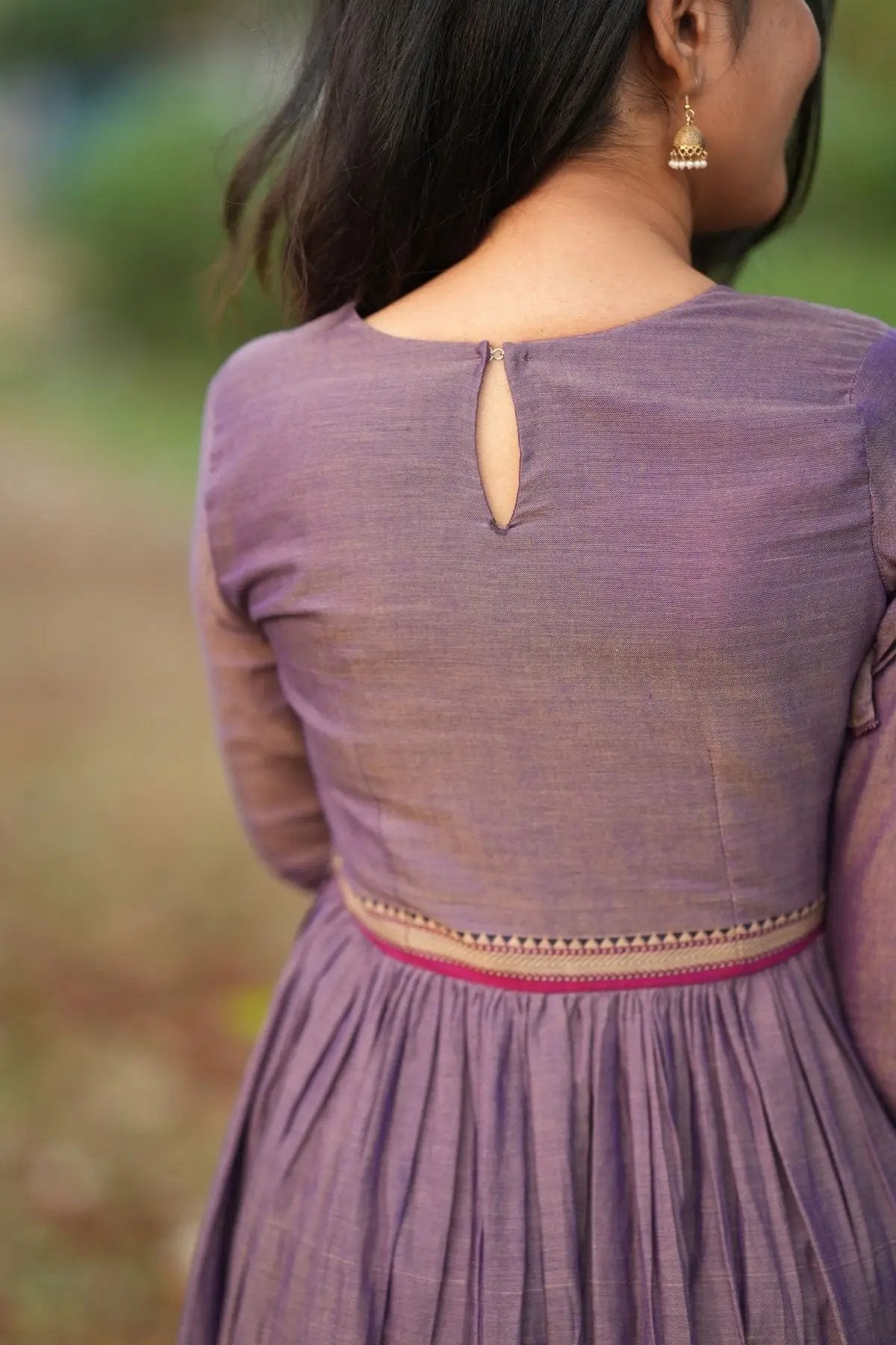 Back view of Lipika Kurta Set in greyish lavender with keyhole button closure and embroidered waistline, part of bullionknot's ceremonial collection.