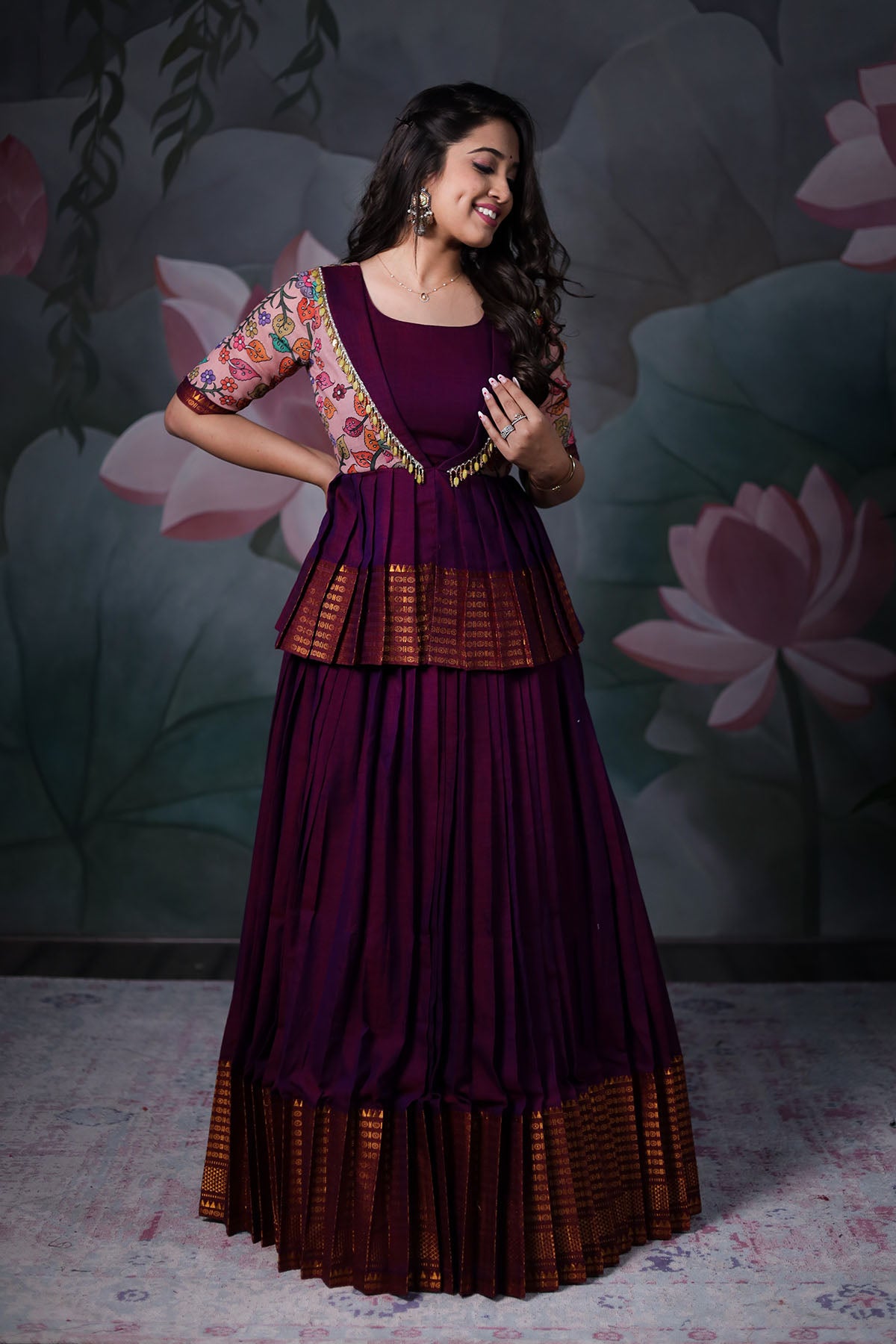 a woman in purple narayanpet lehenga set