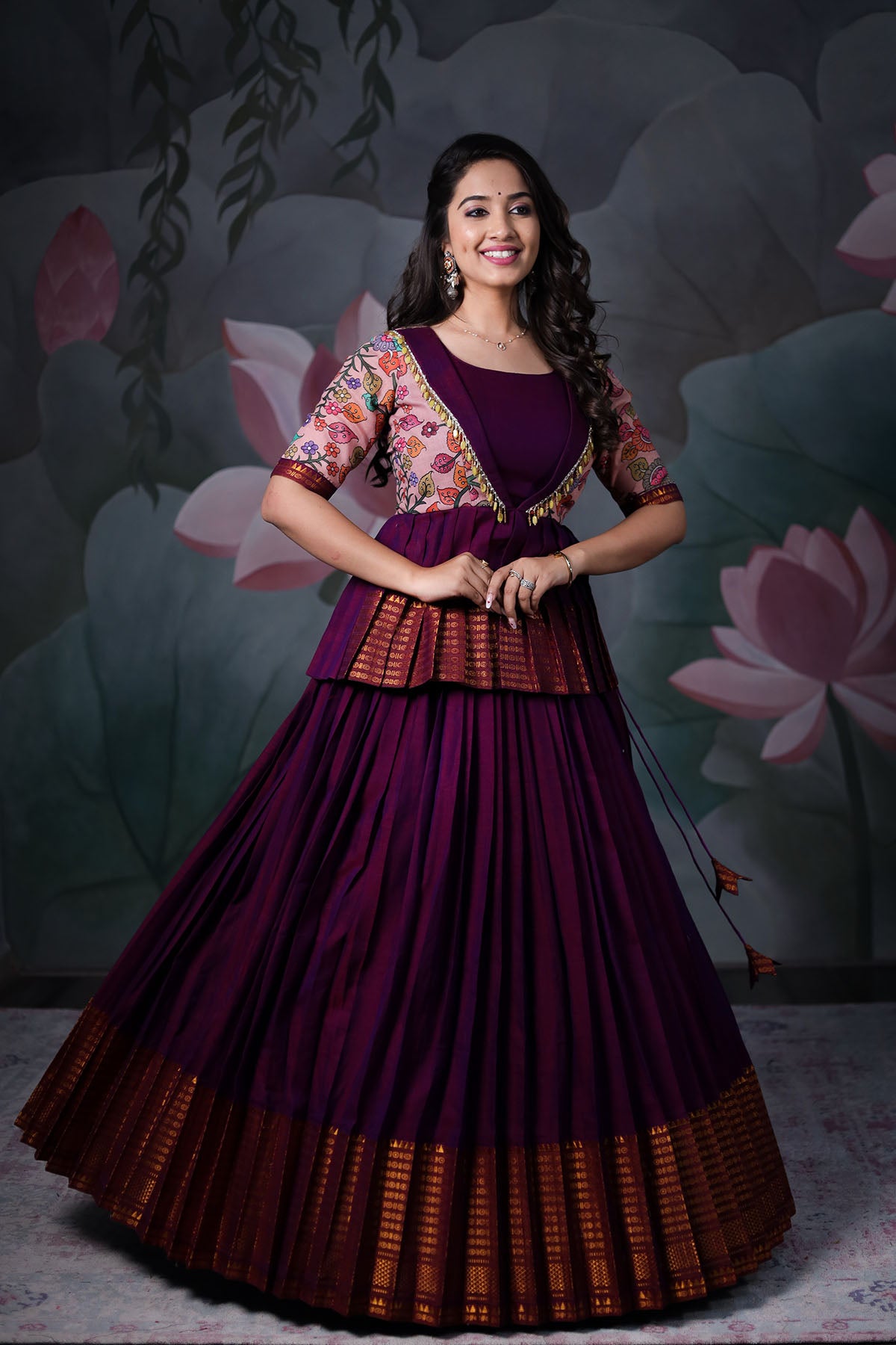 a woman in purple narayanpet handloom lehenga set
