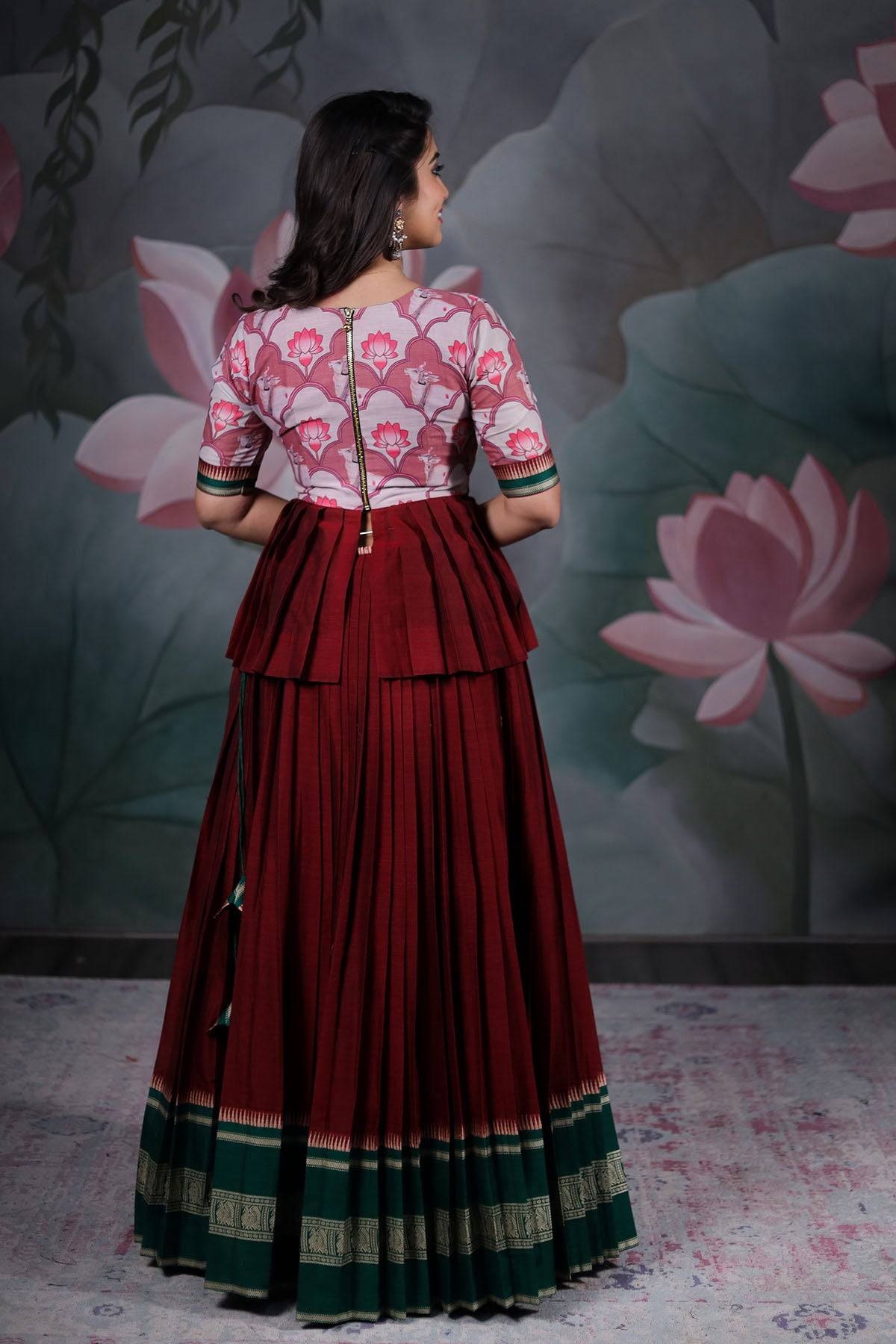 a woman in maroon handloom cotton dress