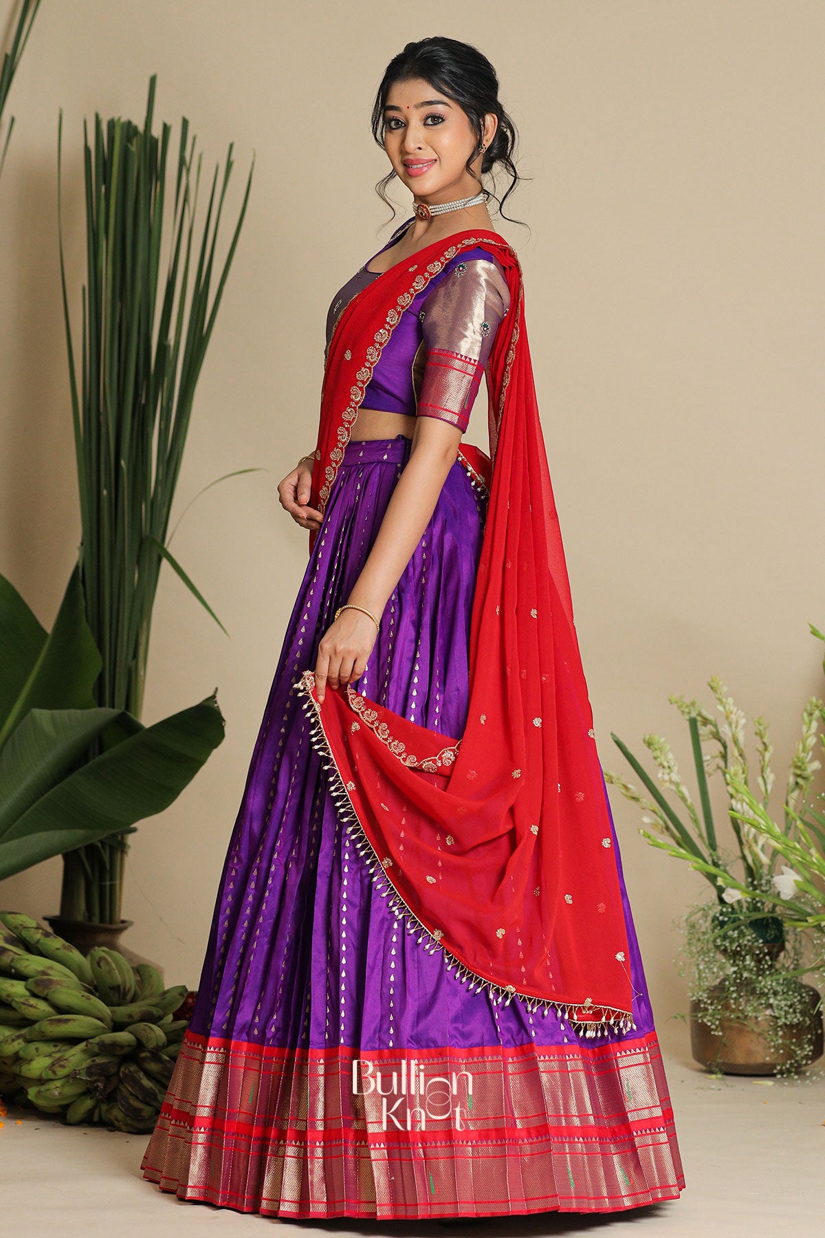 side view of gita pethani lehenga set in purple color