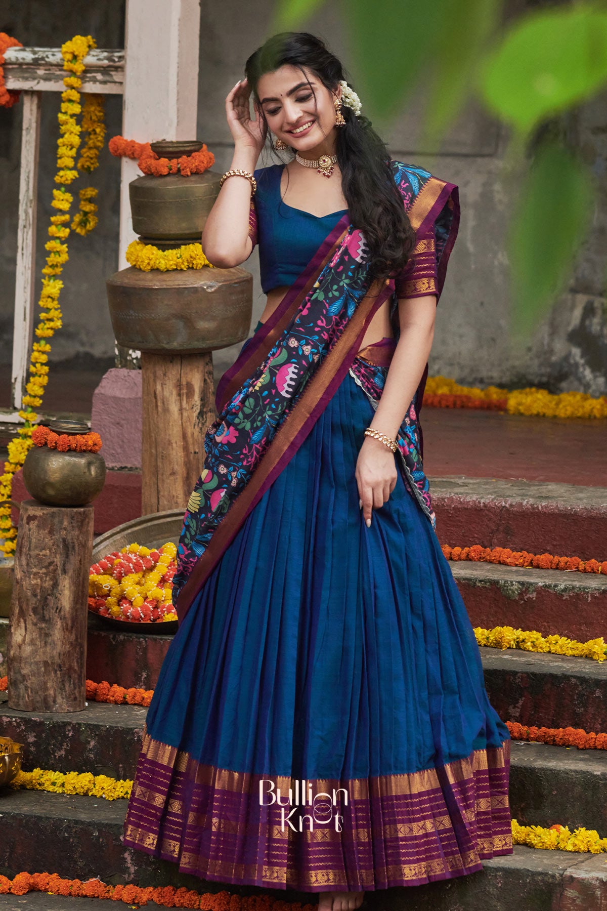 Traditional handloom half saree with structured drape and refined finish