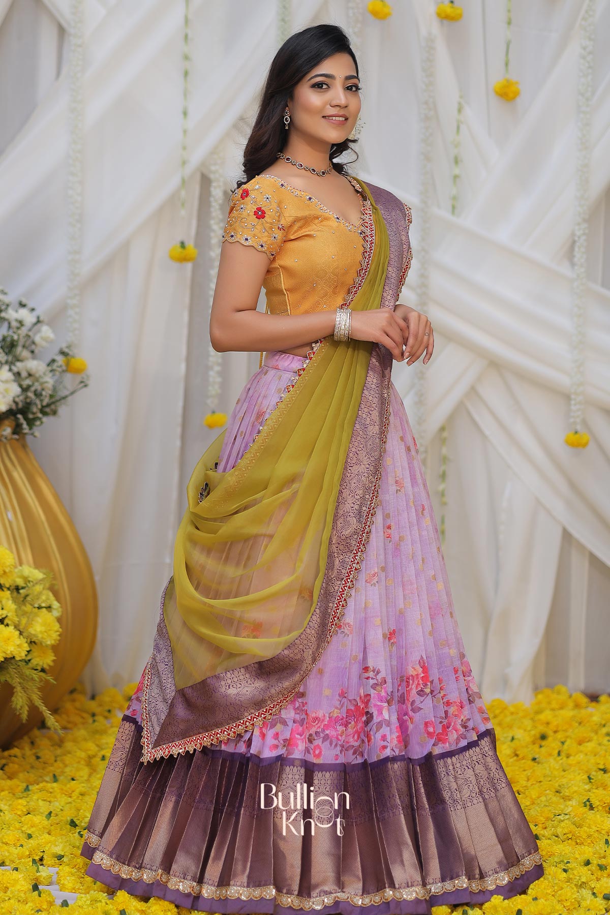 Graceful lavender Banarasi lehenga with gold detailing