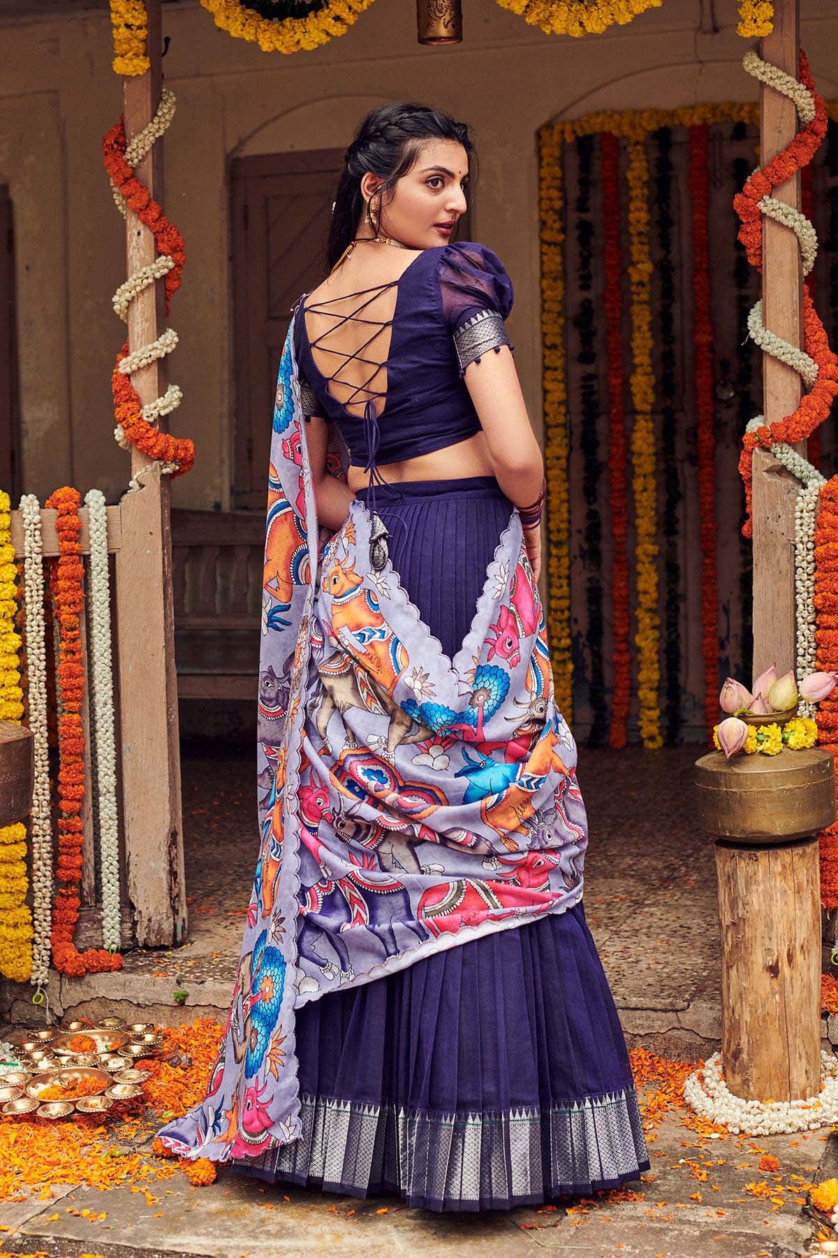 model wore the Admiral Blue Lehenga Set from the collection of Lehengas at Bullionknot