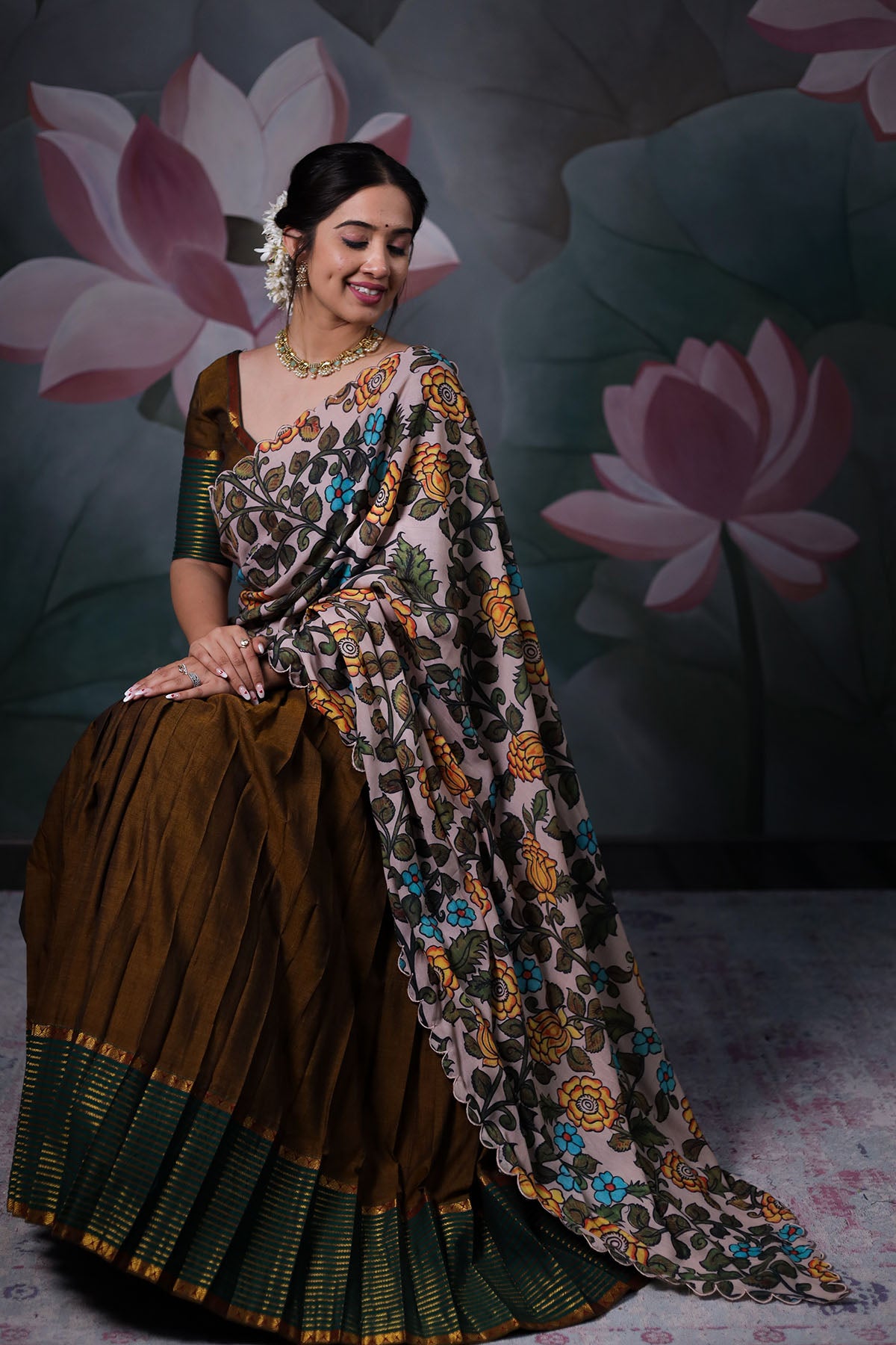 a woman in mehndi green handloom half saree