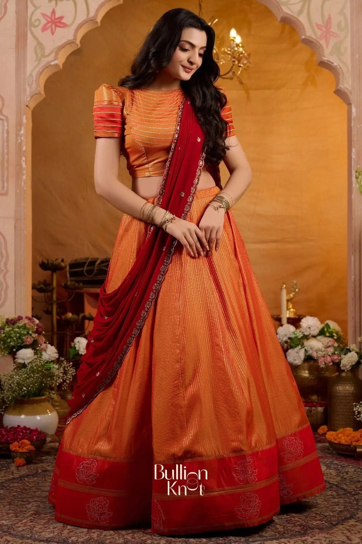 Manohari Soft Silk Orange Lehenga Set