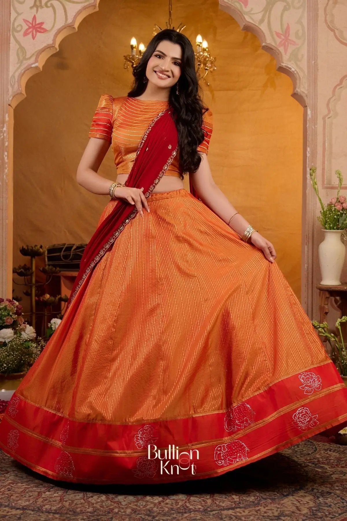 Manohari Soft Silk Orange Lehenga Set
