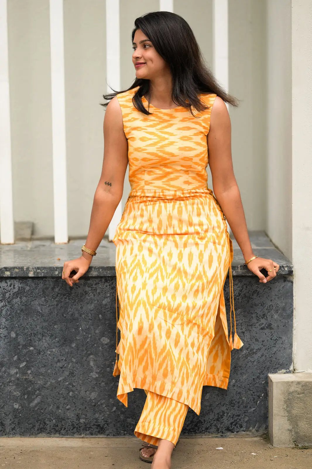 Pomelo Charm Cord Set, seated pose