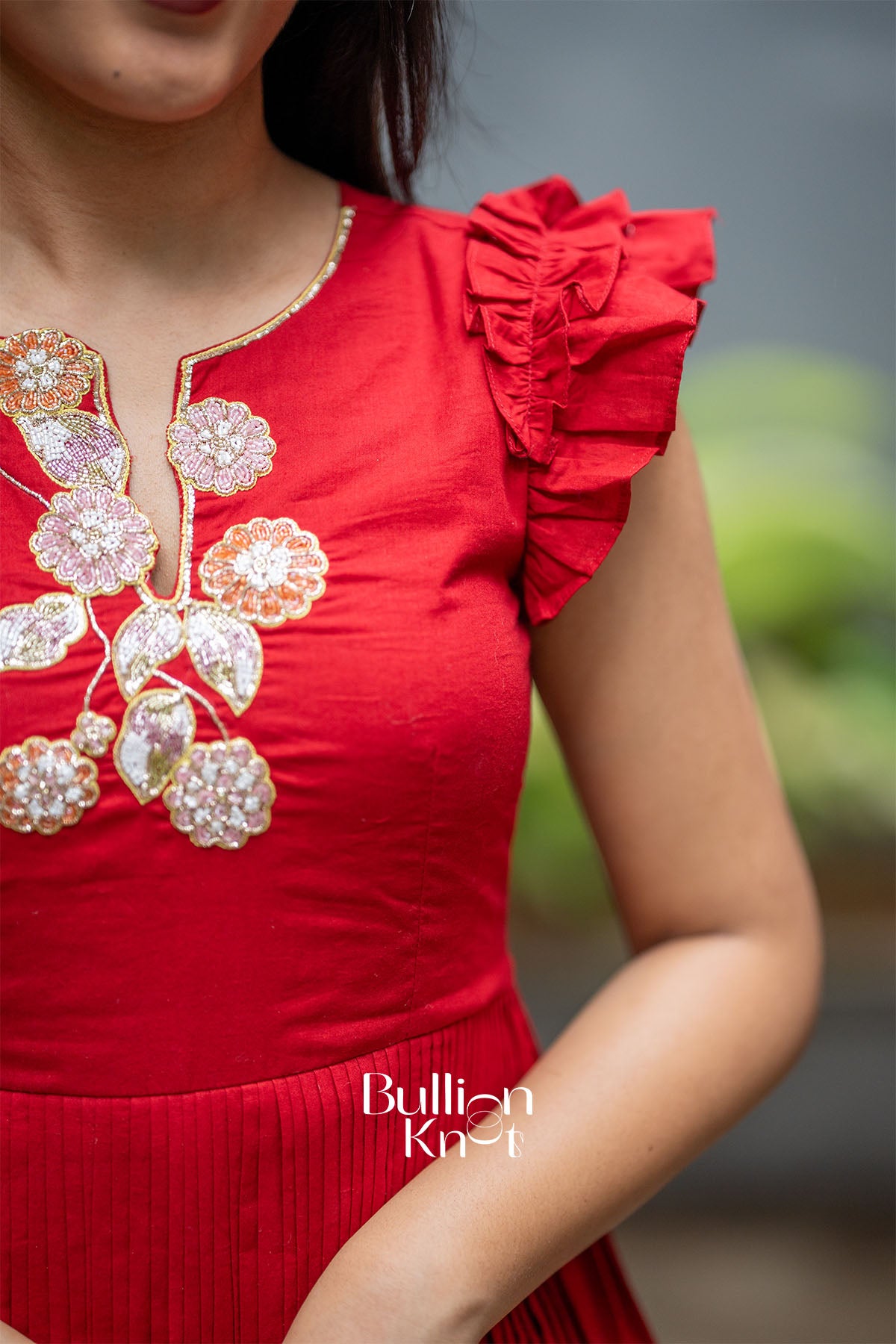 Detailed handwork on Red Mul Cotton Midi Dress, delicate craftsmanship