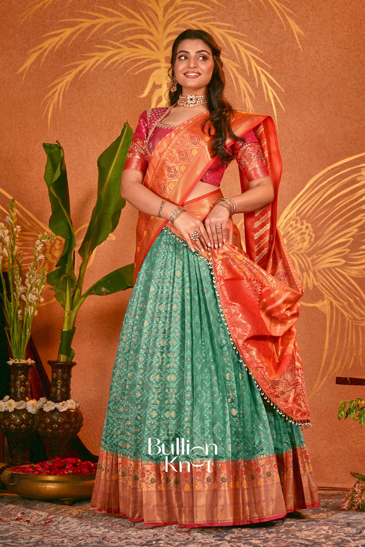 Mandira Orange Patola Silk Lehenga Set