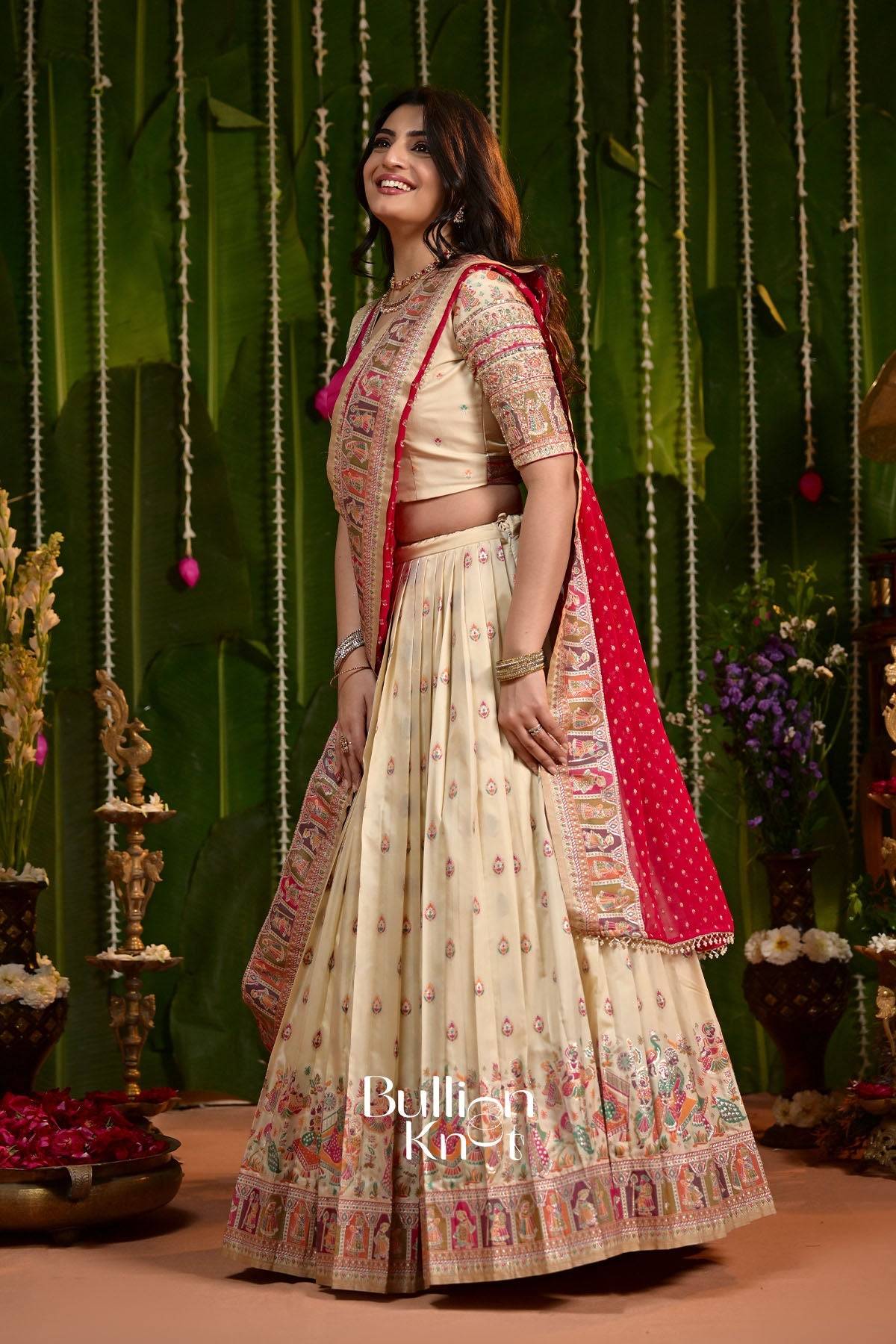 Elegant cream and pink embroidered lehenga set with blouse and dupatta for traditional occasions