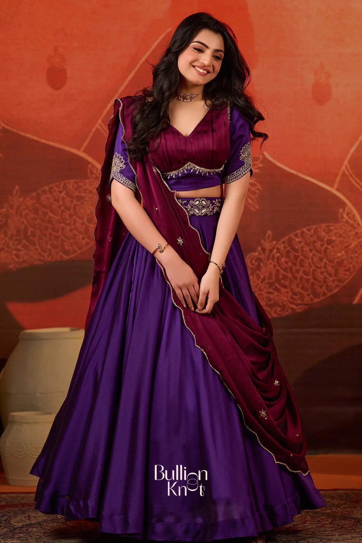 Charming Ariana Charm Lehenga Set in Purple at bullionknot, perfect for traditional events with its vibrant purple and maroon color combination.
