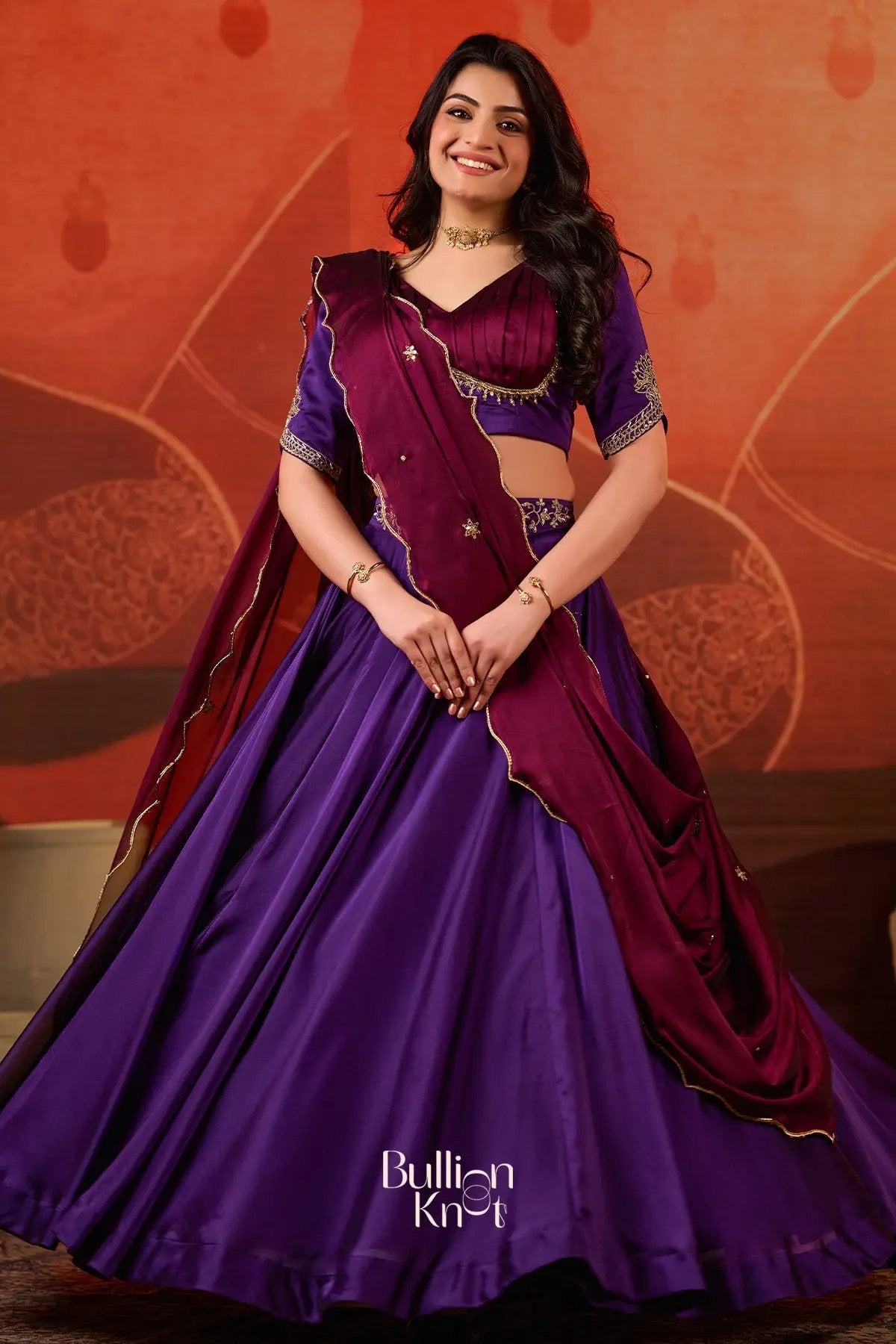 Shop Exclusive Lehenga - Ariana Charm Lehenga Set in Purple at bullionknot, designed with a flowing purple skirt and detailed maroon dupatta.