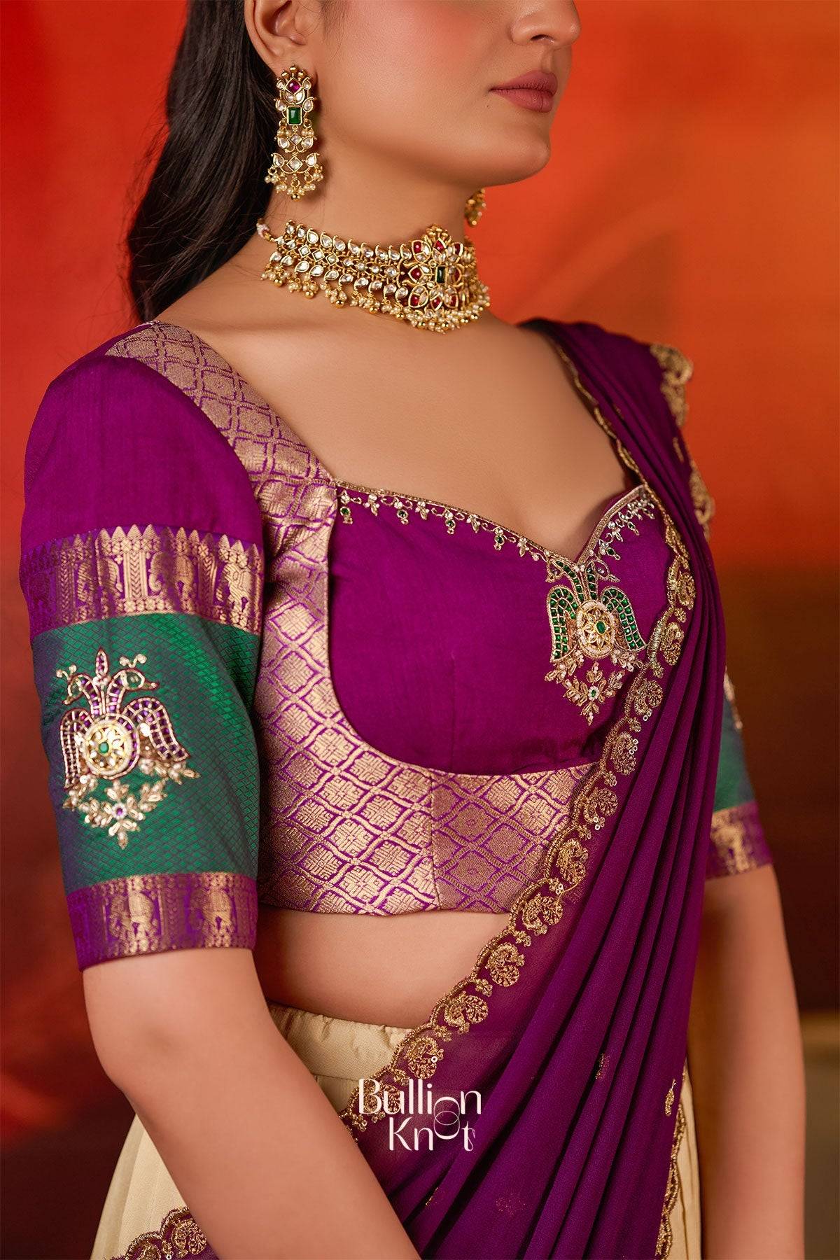 Close-up of Vishakha Half Saree in Vanilla at bullionknot, highlighting intricate embroidery on the purple blouse and dupatta with gold detailing.