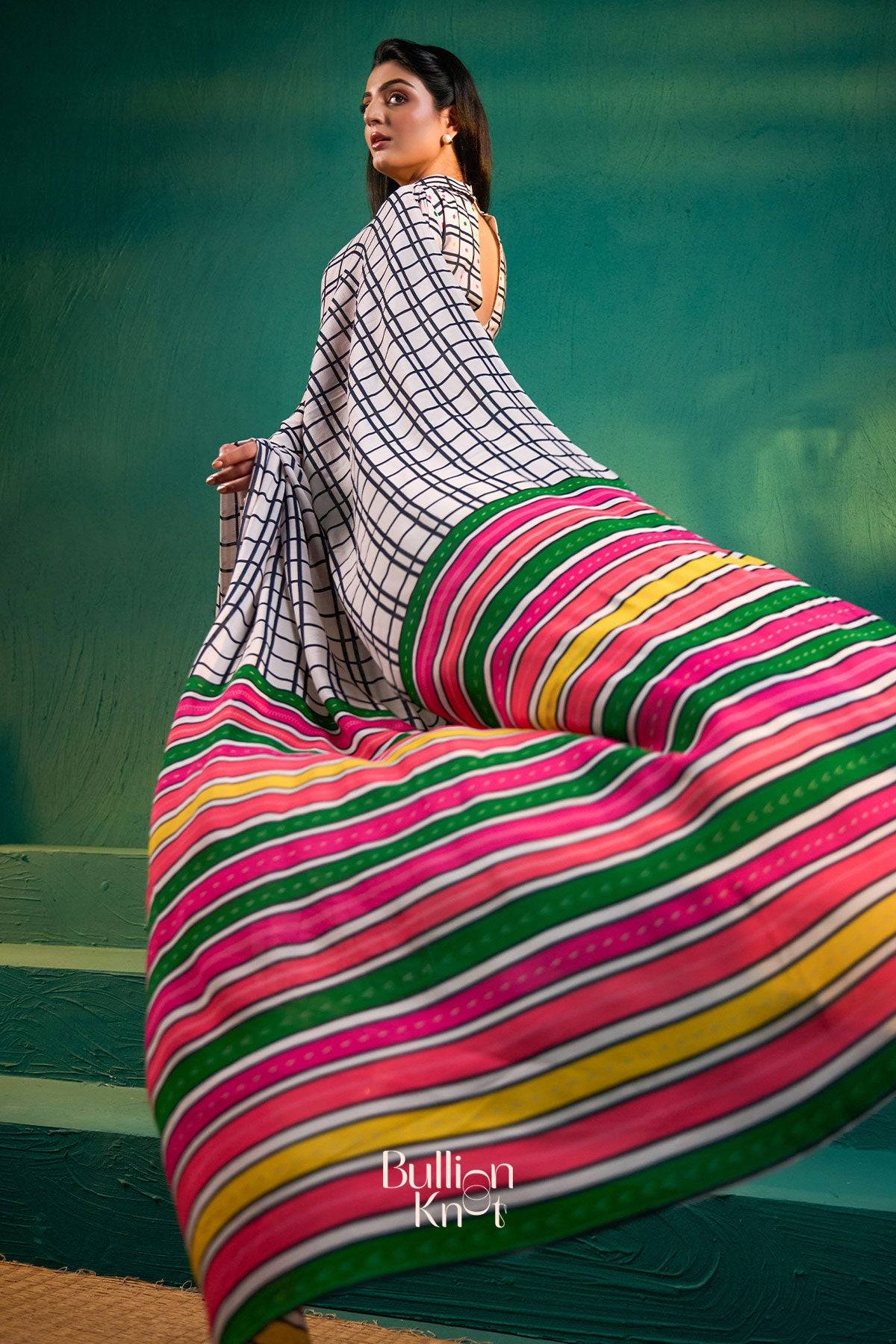 Flowing pallu of Dimple Saree in White & Black with multicolor stripes, highlighting traditional elegance at Bullionknot.