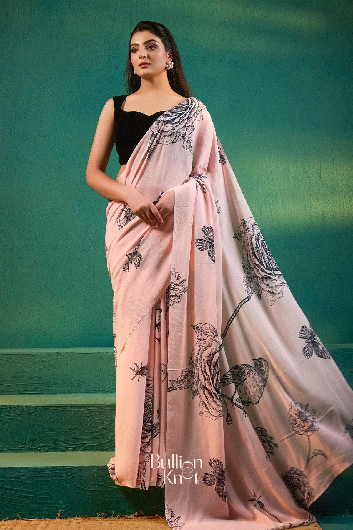 Exclusive Sarees - Sreeleela Saree in Pastel Pink at bullionknot featuring floral and bird prints, ideal for summer occasions and festive wear.