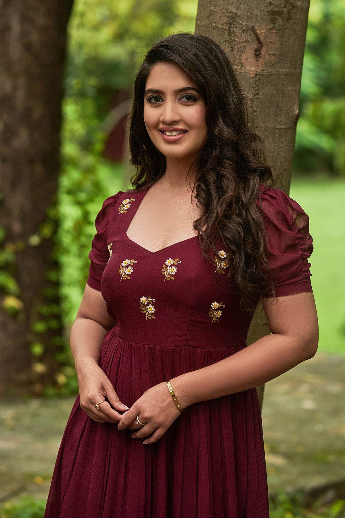 a woman in Boysenberry Georgette Frock