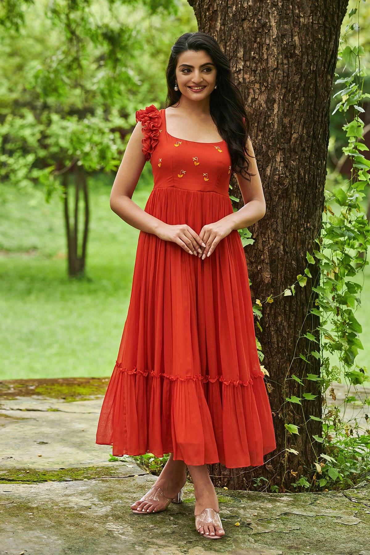 Elegant orange ethnic midi dress with ruffle details