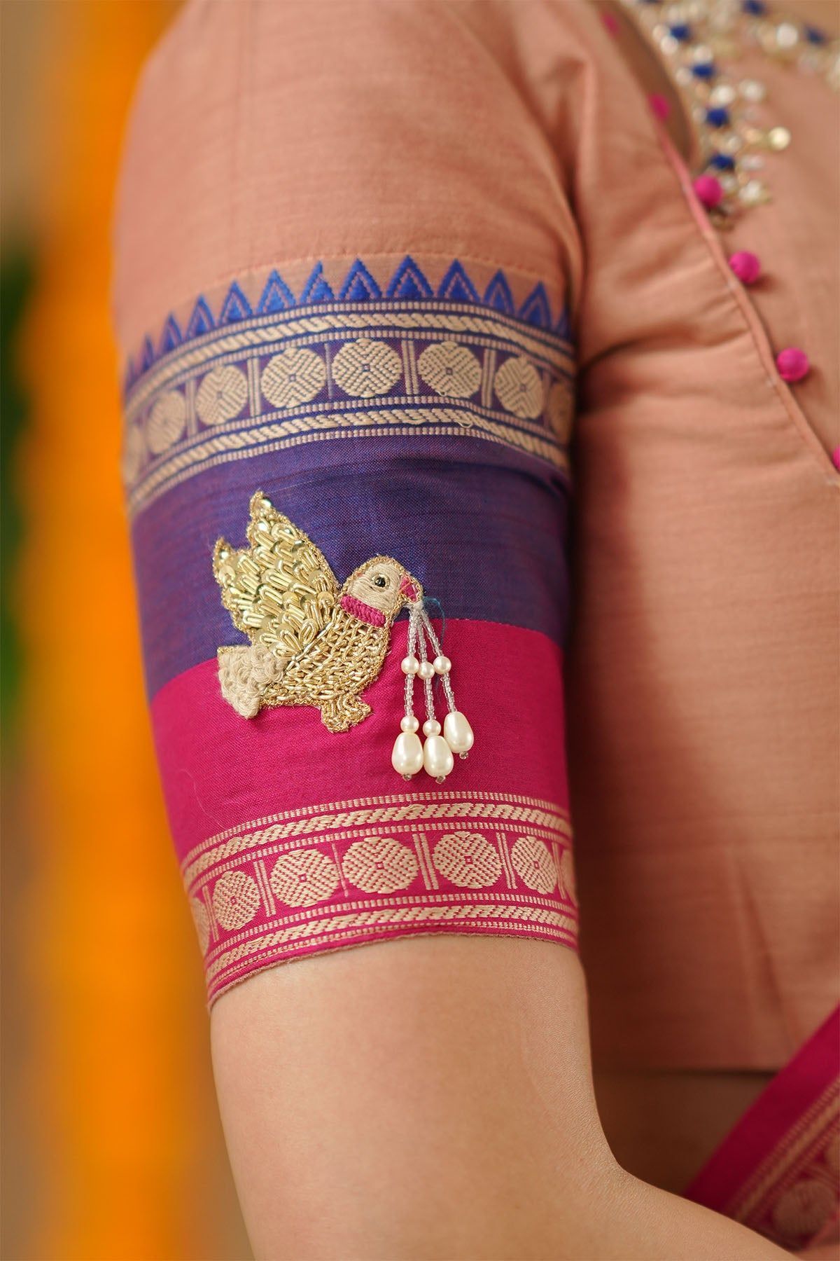 Navy blue half saree with gold embroidery and cutout blouse detail