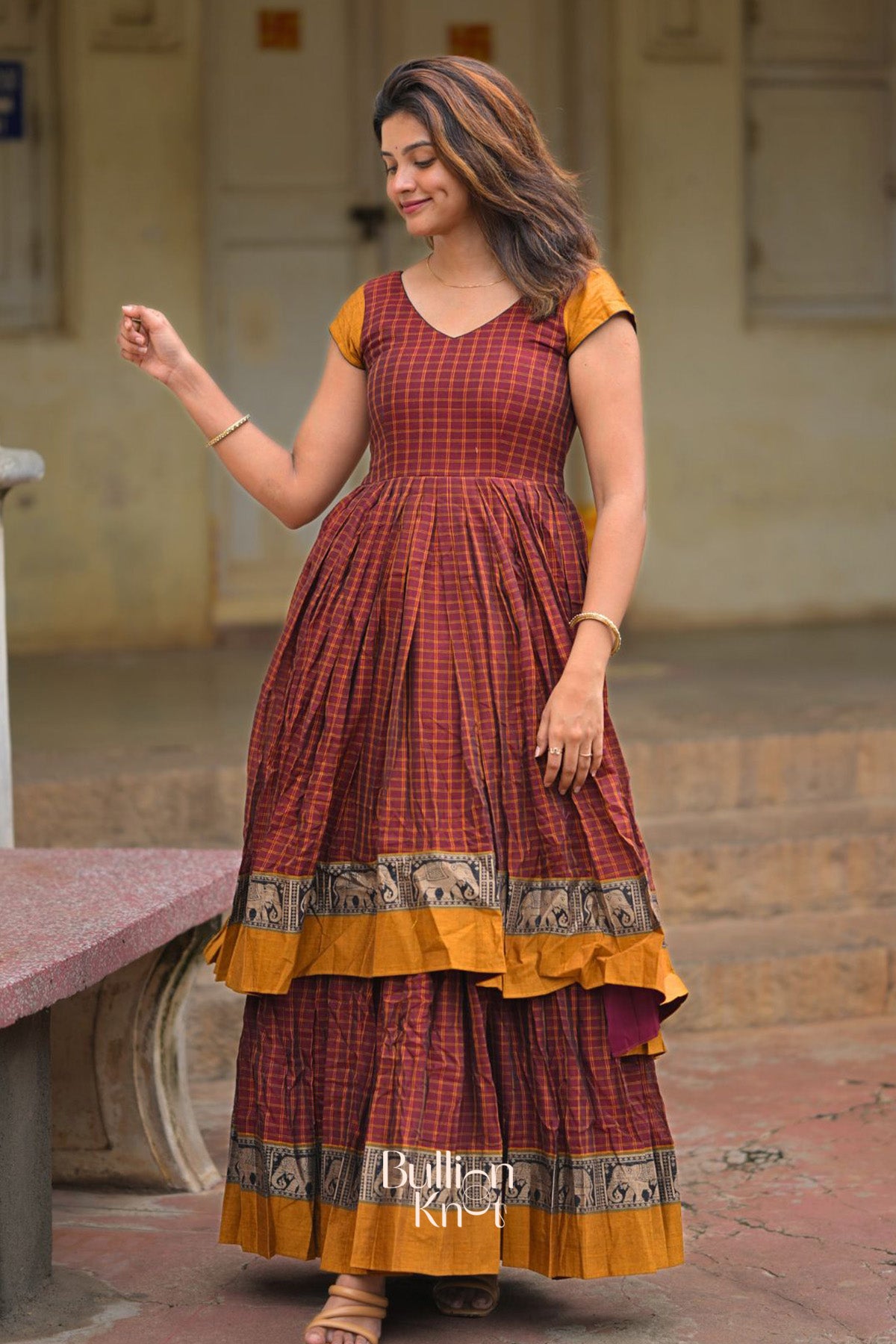 Stylish Gajadanta Indo-Western dress featuring layered design and V-neckline