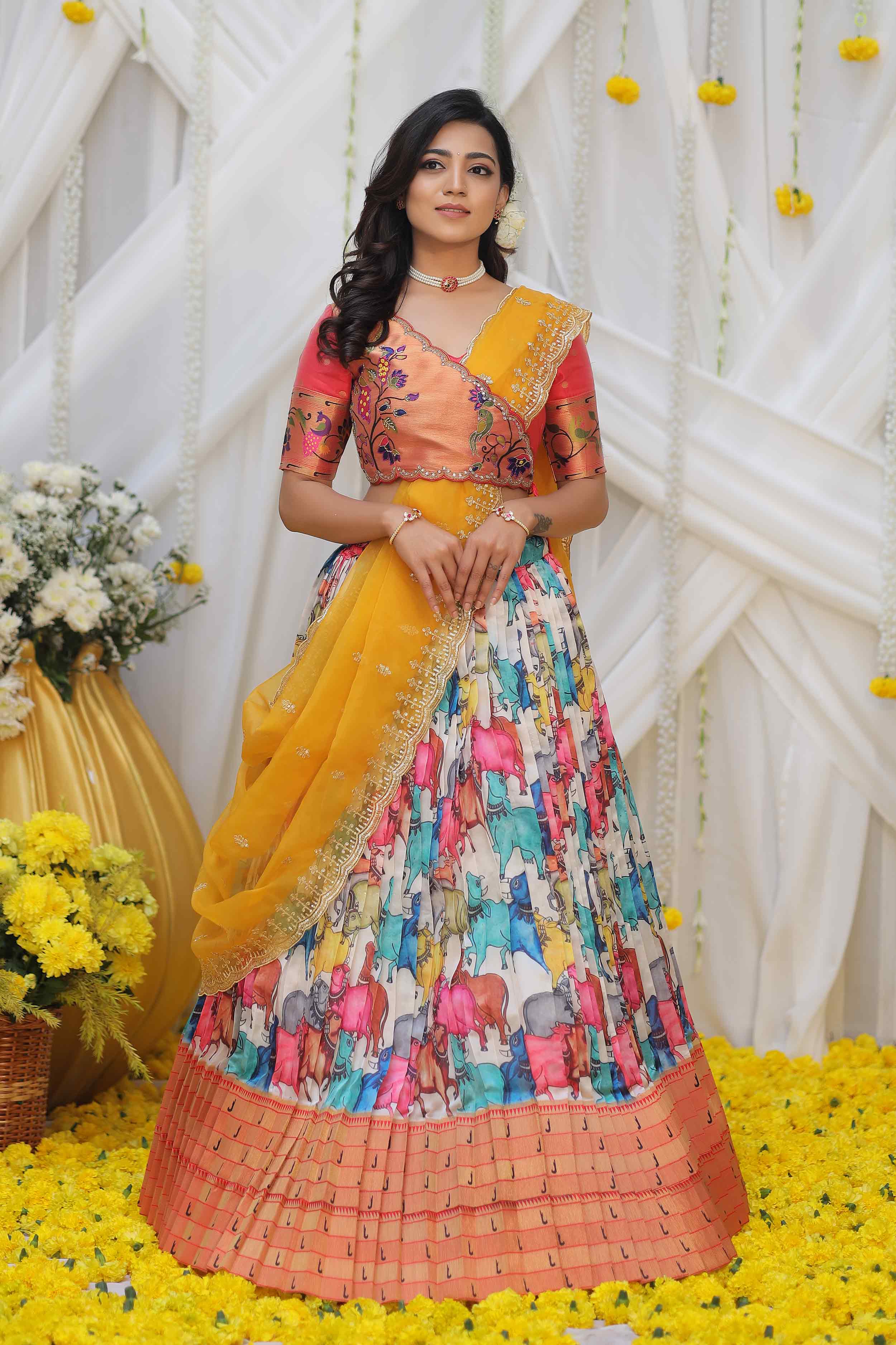 yellow and white pattu half saree