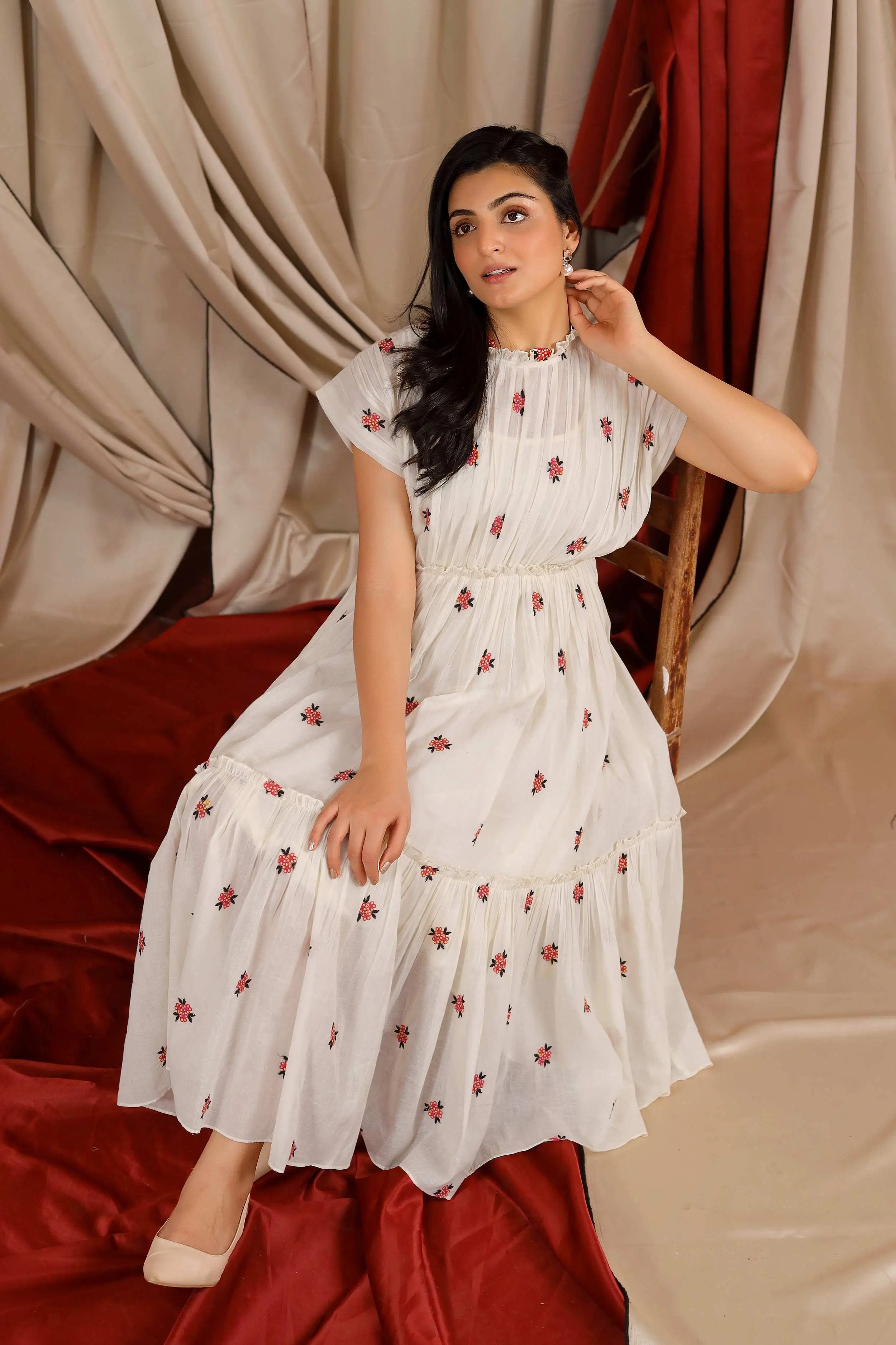 a woman in white midi dress