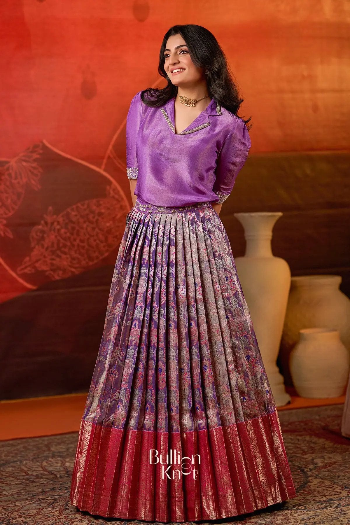 Traditional Azaira Indo Western Lehenga in Red at bullionknot with a vibrant pleated skirt and silk blouse, ideal for weddings and festivals.