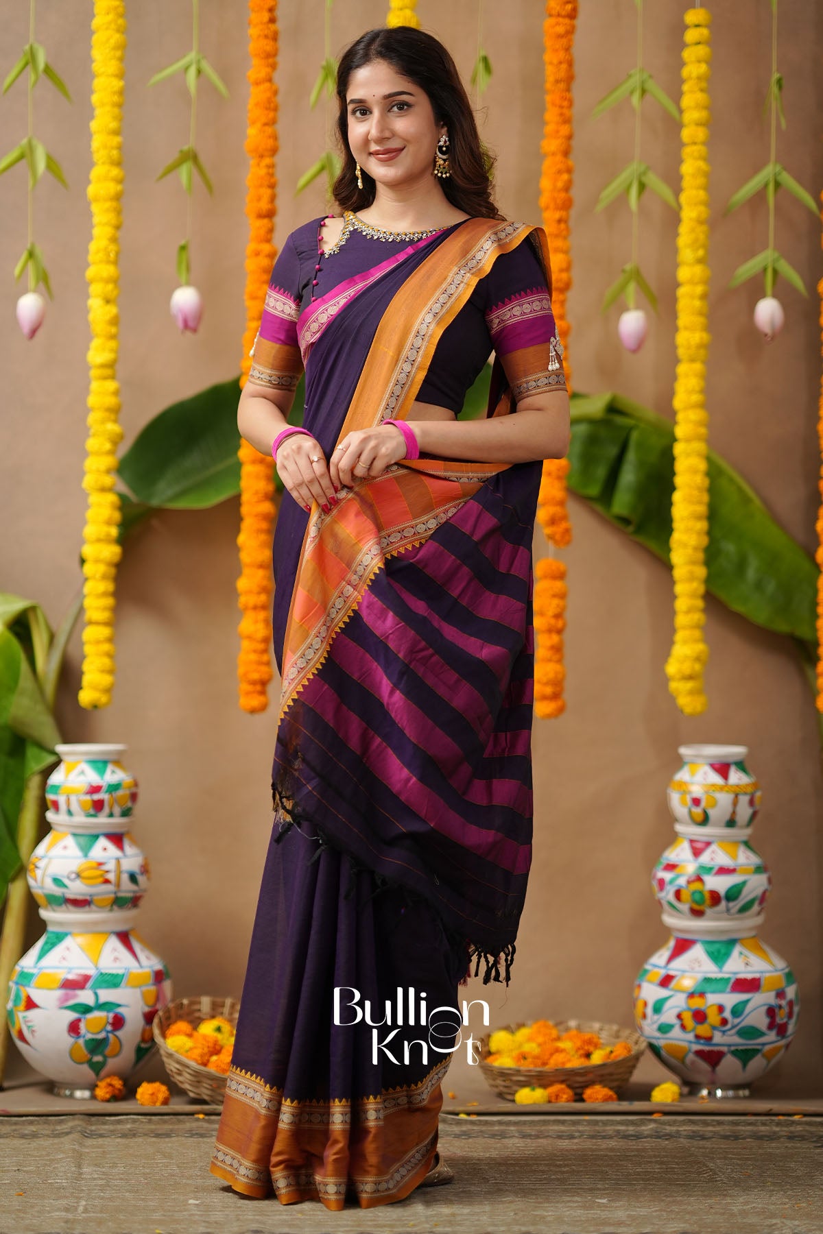 Woman in a colorful saree side view