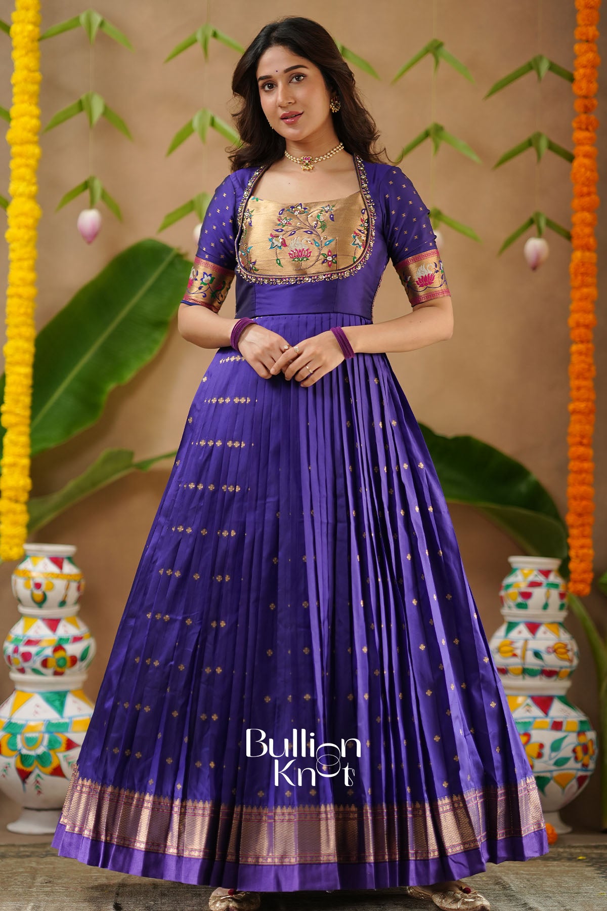 Kanika Soft Silk Blue Anarkali Gown with delicate handwork detailing – BullionKnot.”