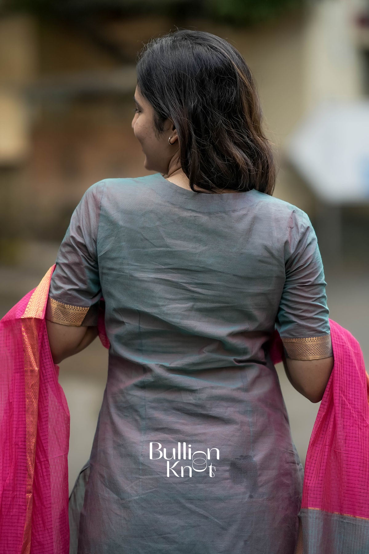 Back view of Khushali Grey Suit Set showcasing detailed finishing