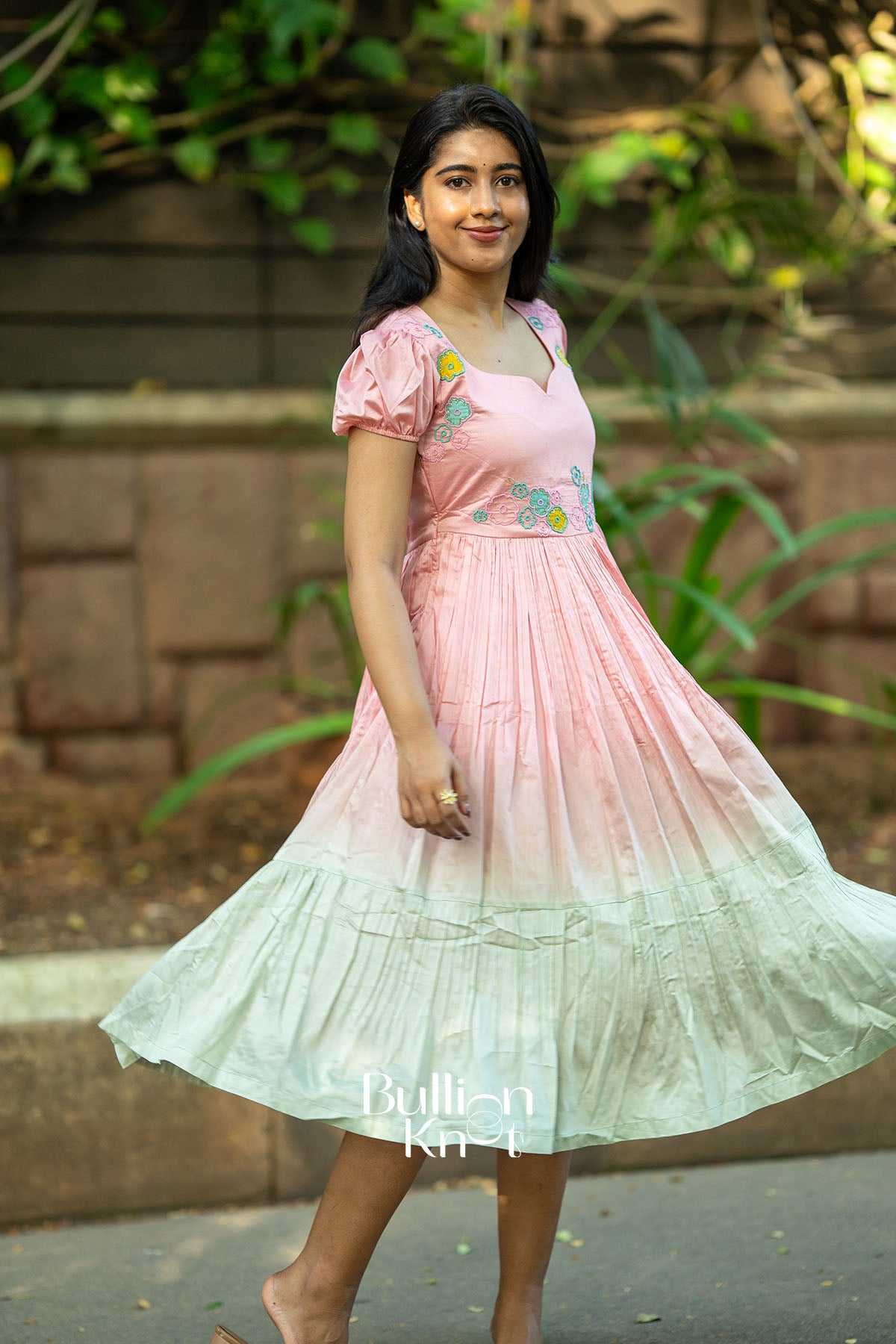 Side view of peach Chanderi midi dress for women