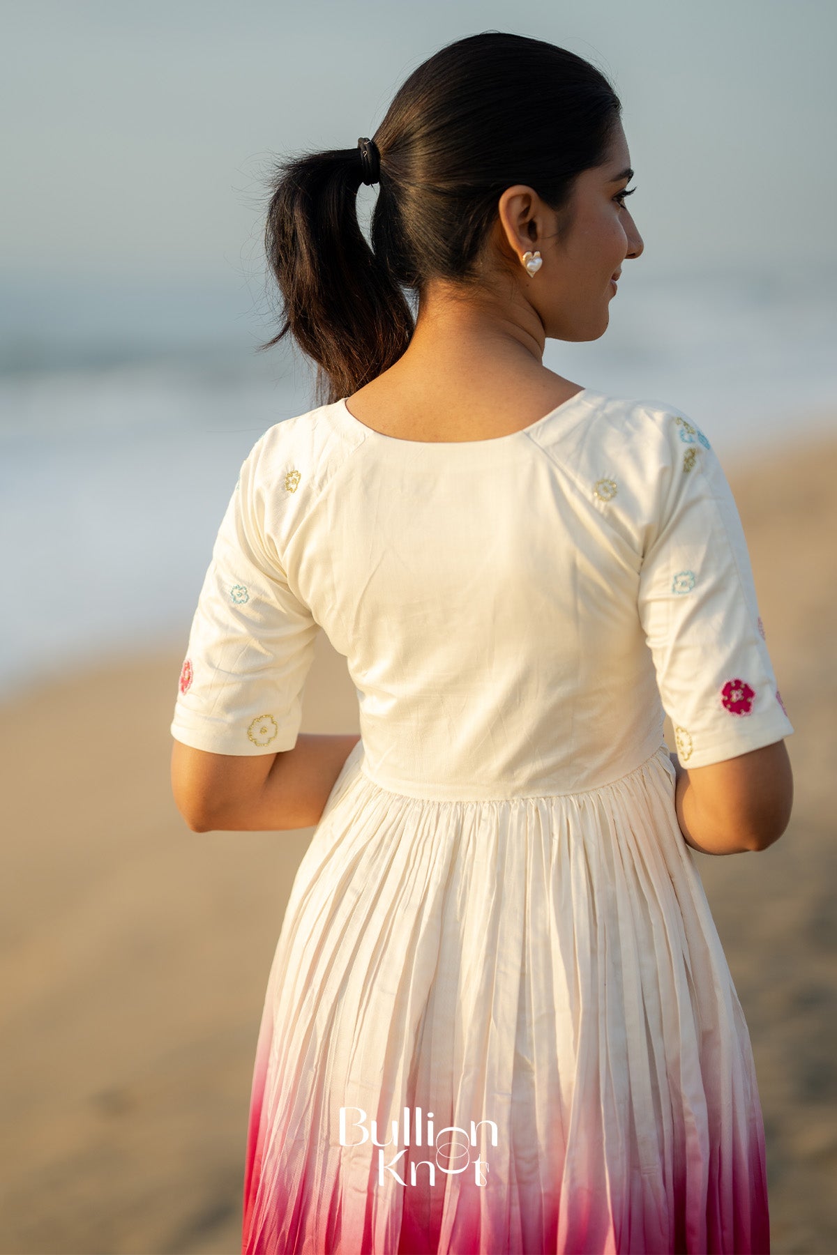Back view of white Chanderi midi dress