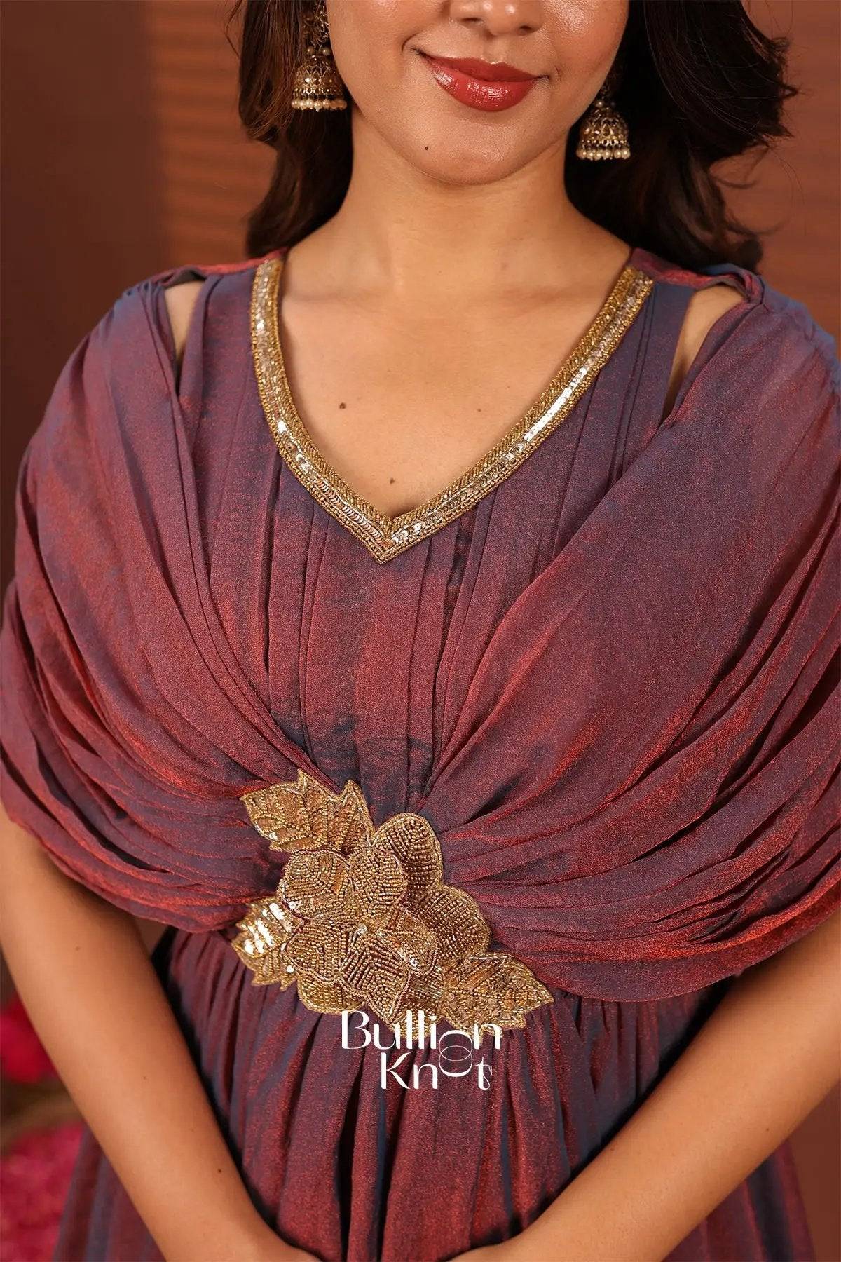 Close-up of gold floral embroidery on Nyasa Wine Indowestern dress with embellished neckline
