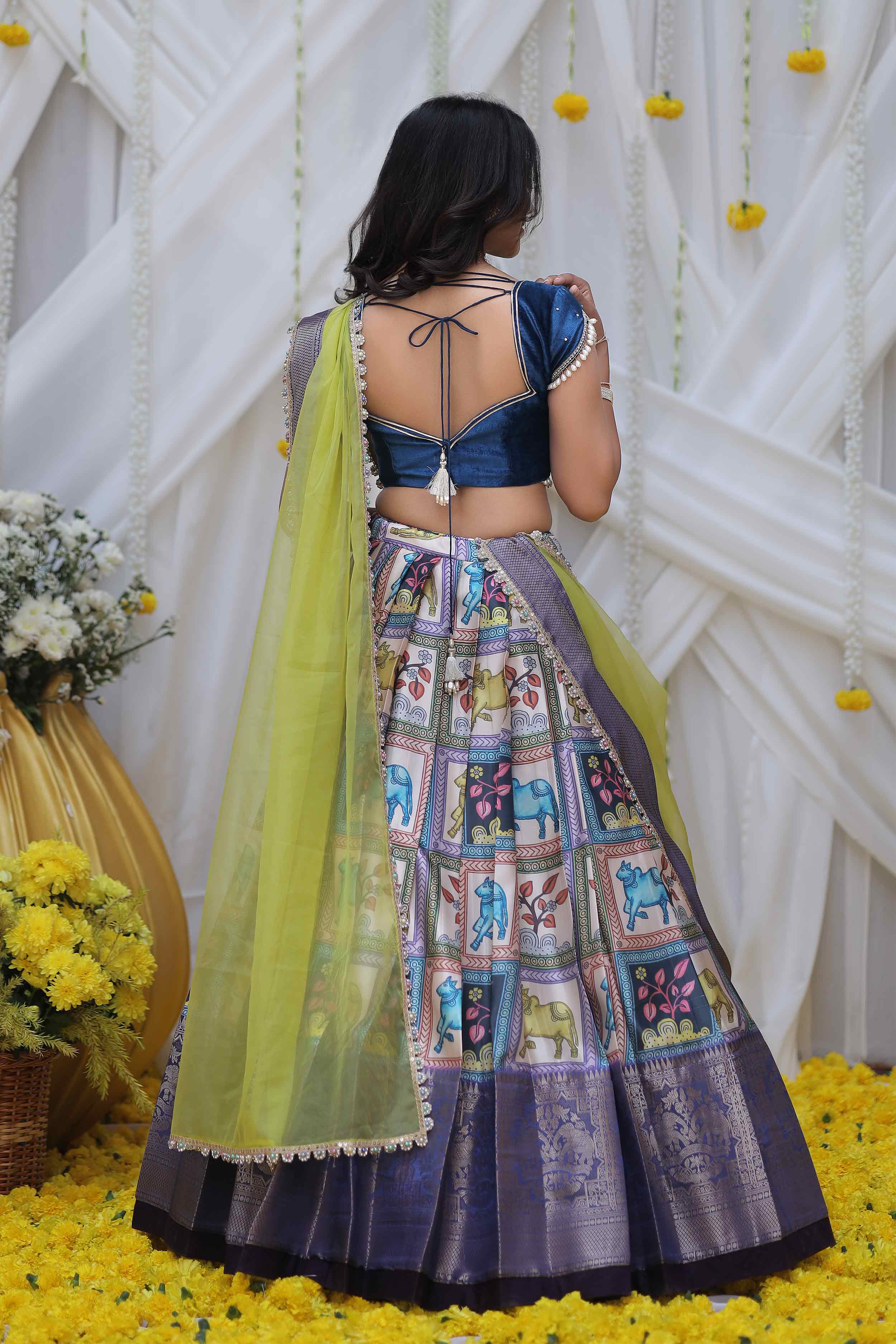 a woman in Pattu Dress