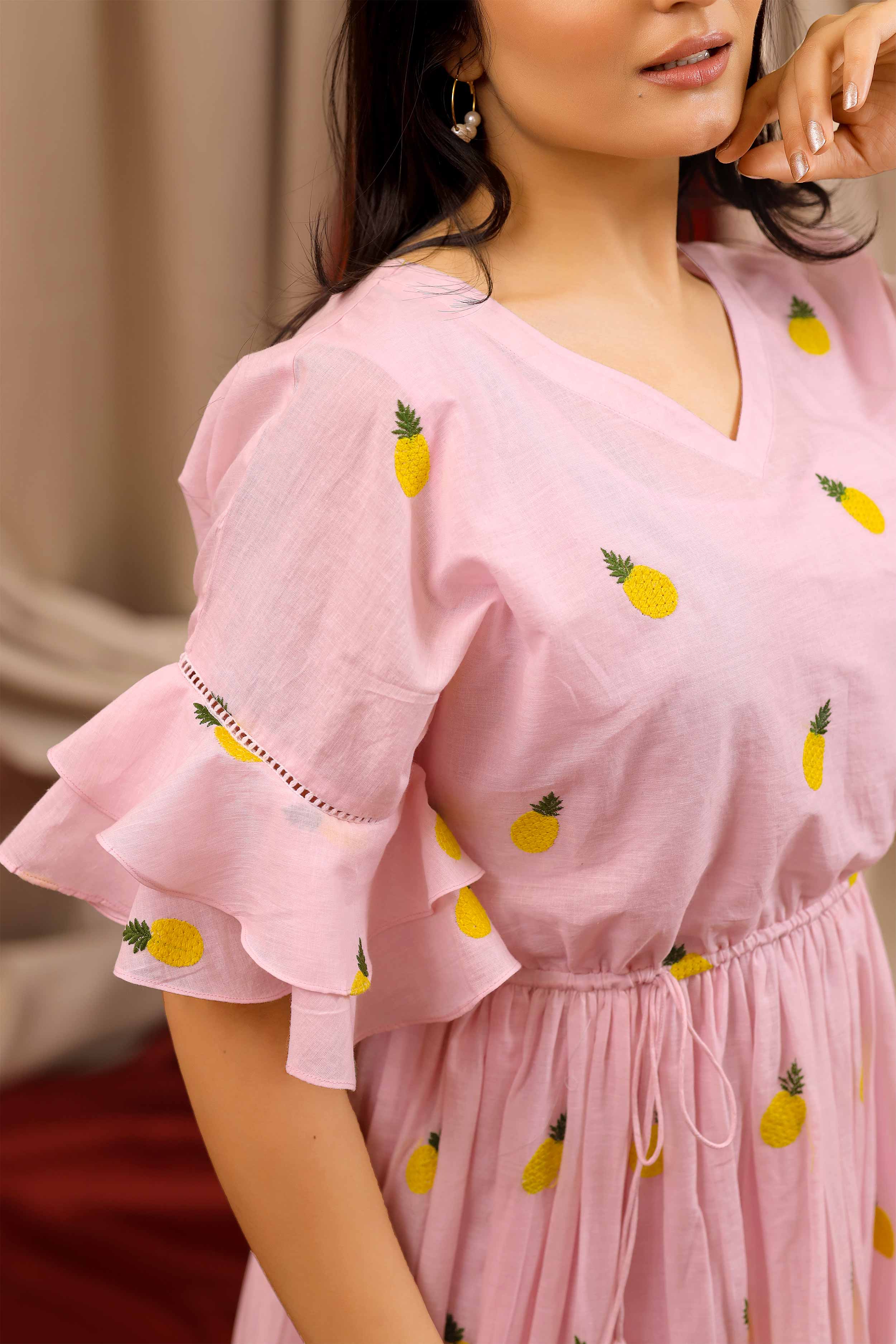 a woman in Pineapple Summer Midi Dress in Pastel Piink - Bullionknot