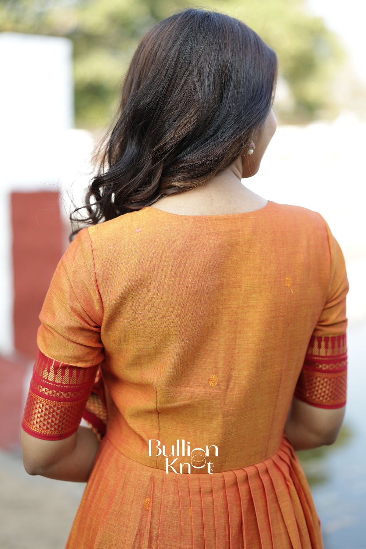 Pravika Handloom Orange Anarkali Suit Set