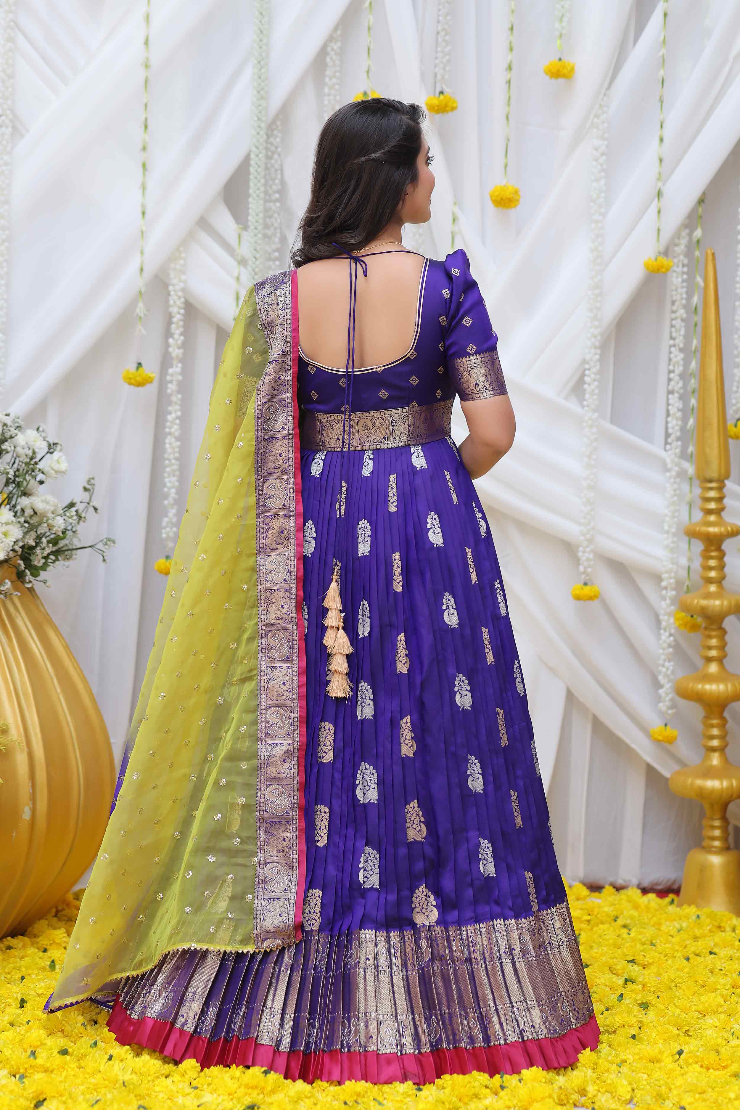 a woman in long blue dress