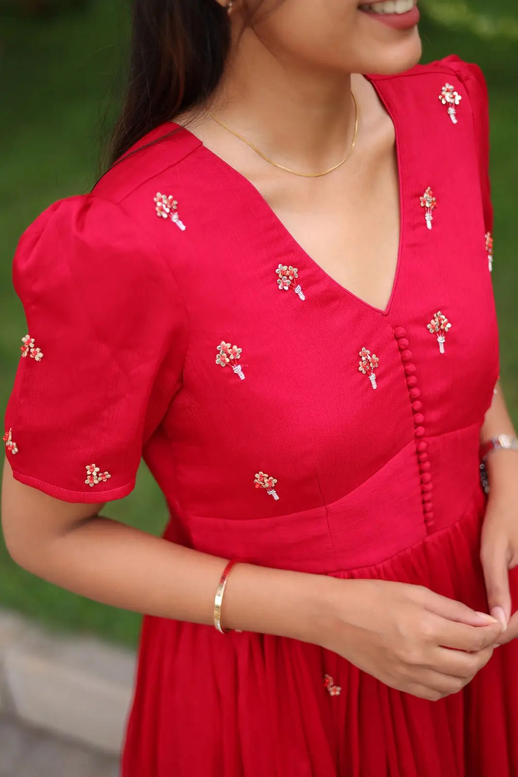 Close-up of embroidery on Radiant Ruby Midi Dress