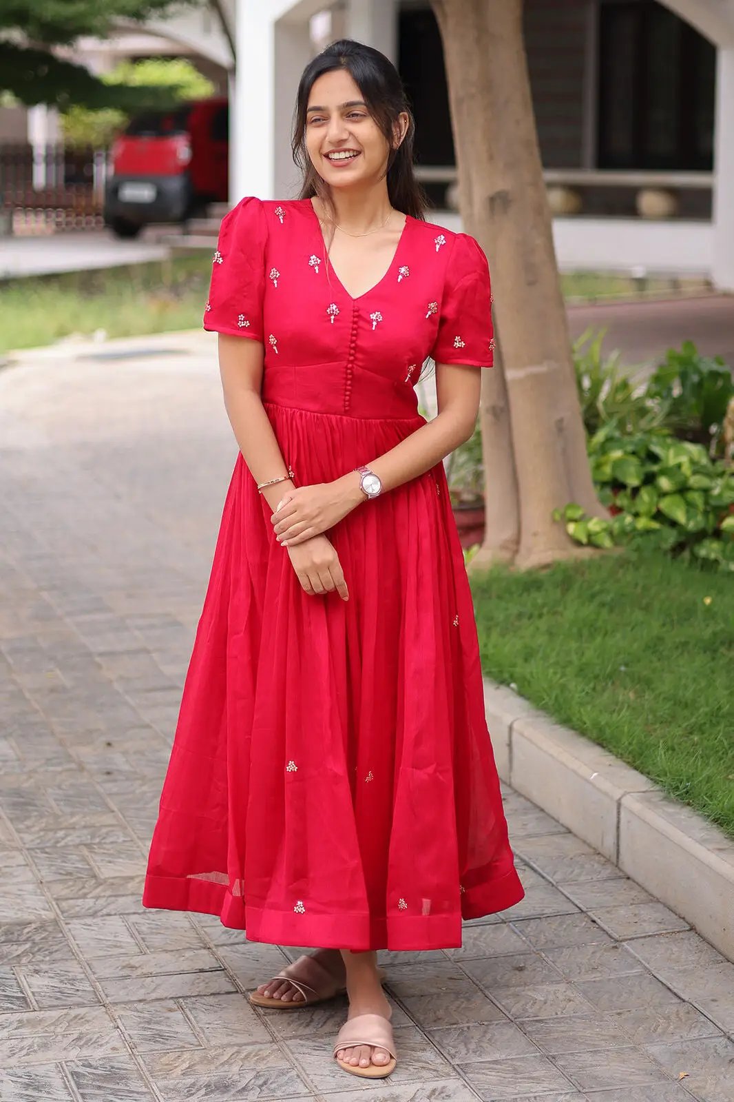Radiant Ruby Midi Dress in red, outdoor setting