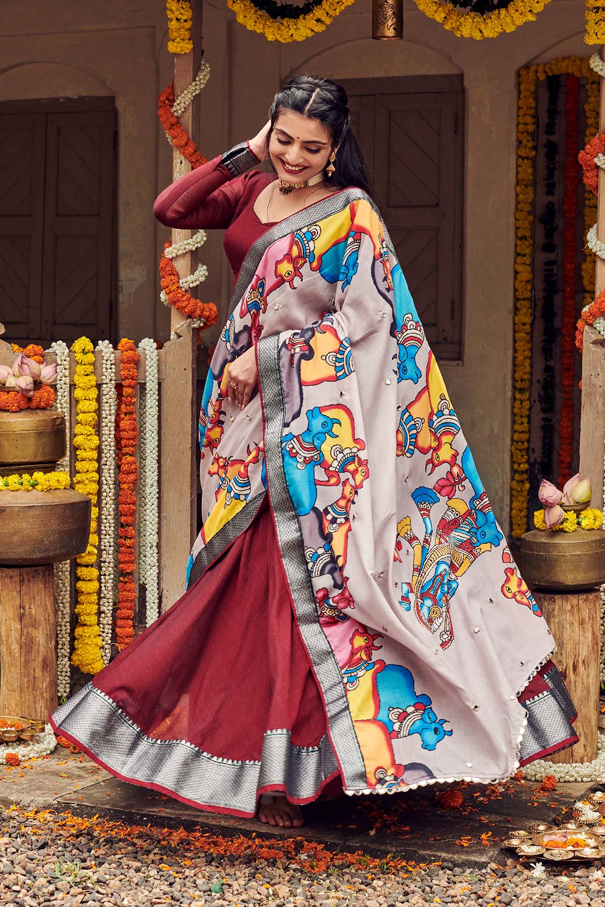 a women in Ethnic wear Lehenga dress with cotton dupatta at Marriage function, dress name Shisha kalamkari Lehenga Set from Bullionknot