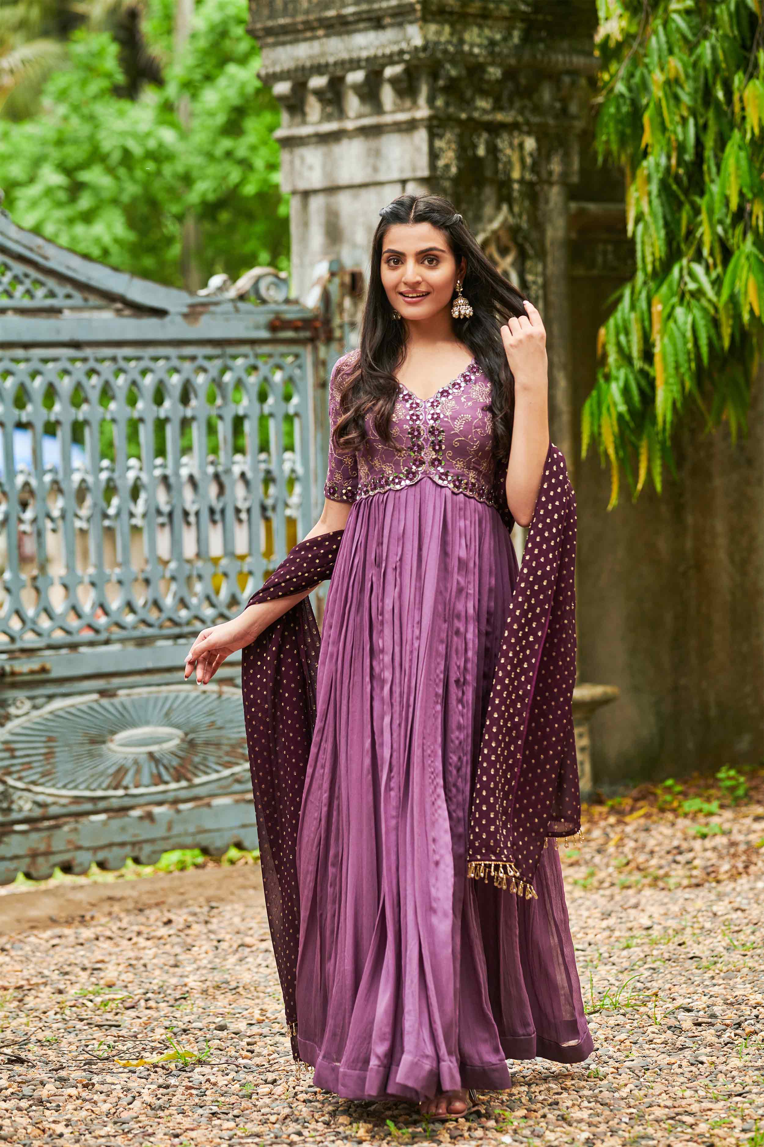 a woman in Anarkali suits