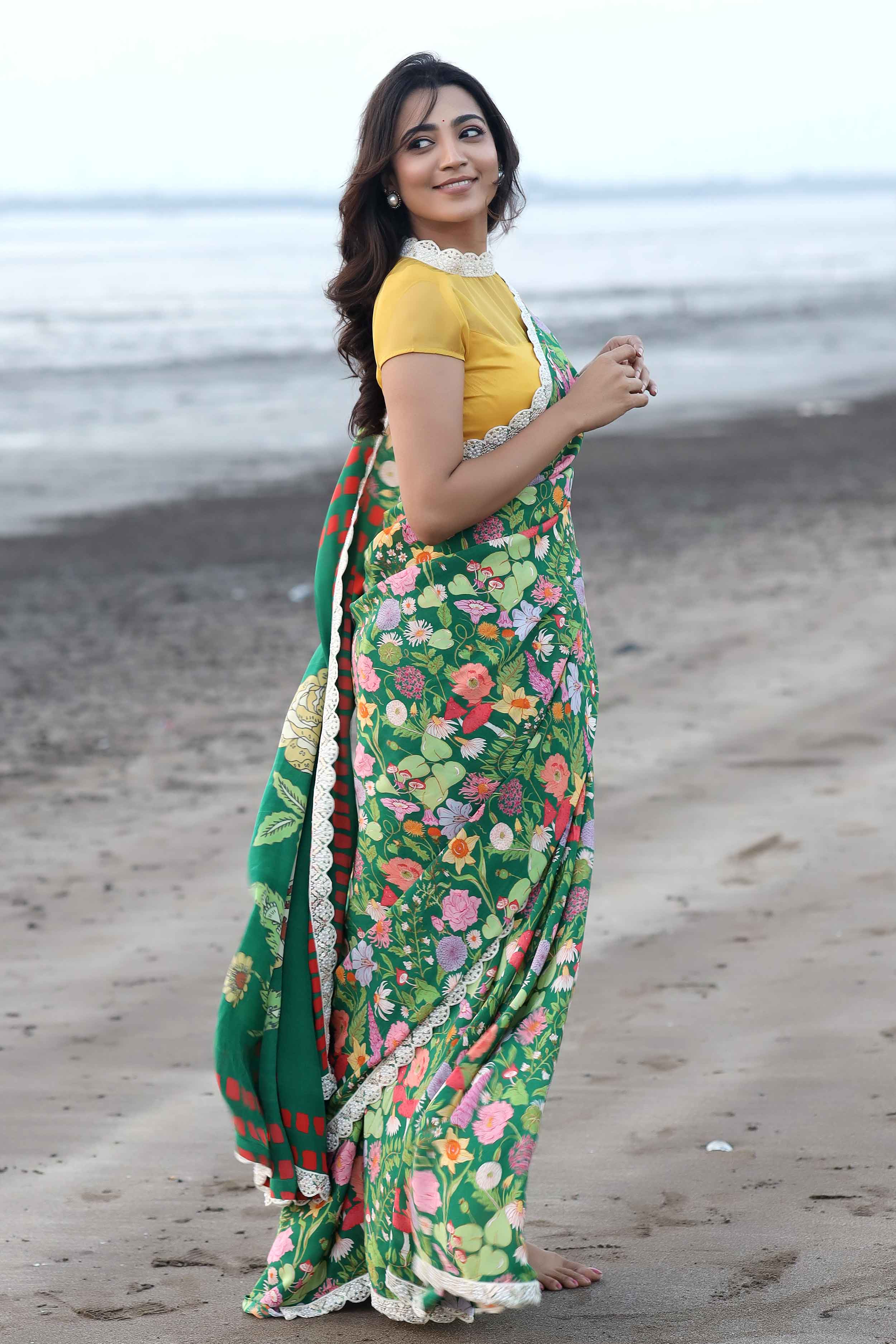 a woman in Retro print Silk saree
