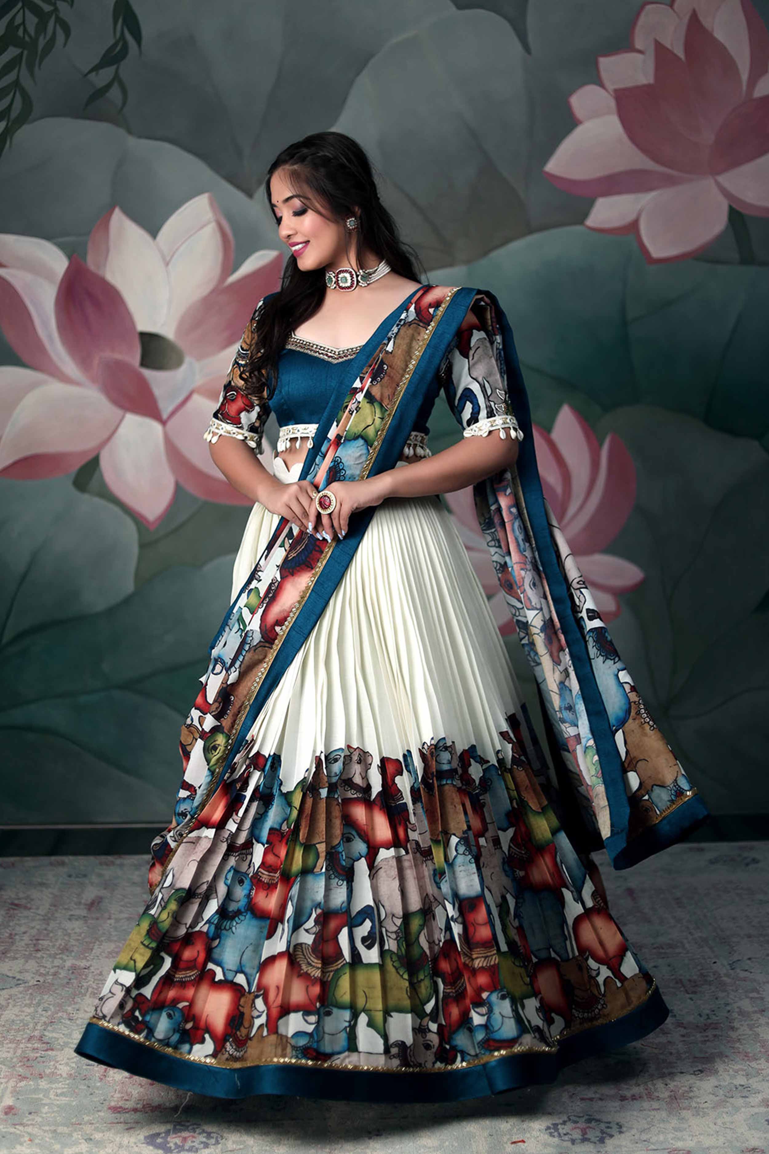 a model posing with Pen Kalamkari Handloom Design Lehenga Dress with cotton dupatta from the varieties of lehengas designs from Bullionknot
