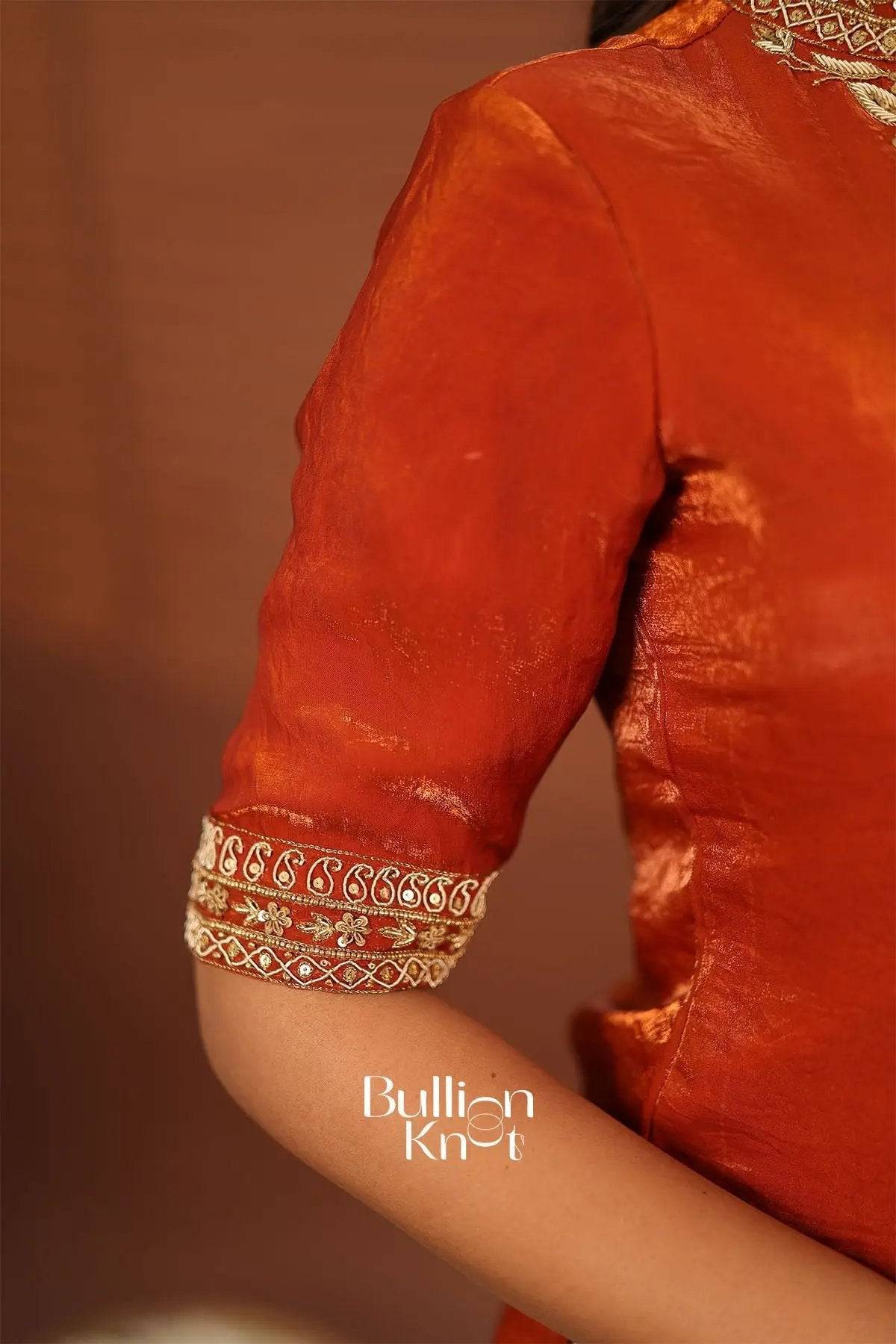 Orange silk Indo-western dress with embroidered sleeve cuff