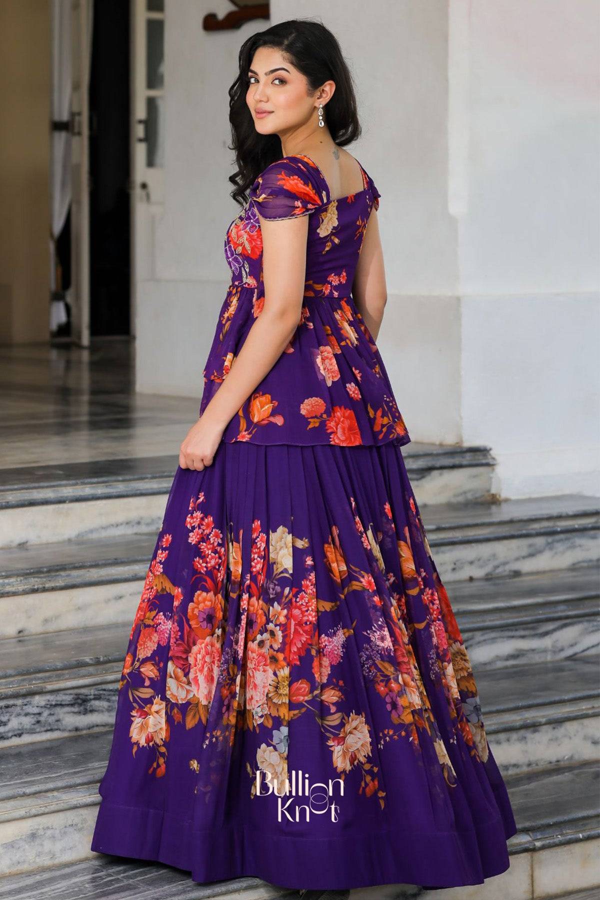 Stylish Ziana Indo-Western gown with red and peach floral details
